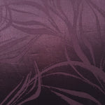 Close-up of Seaweed self-jacquard motif on silky tonal viscose fabric