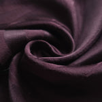 Close-up of draped Seaweed tonal jacquard fabric showing silky texture and fold detail