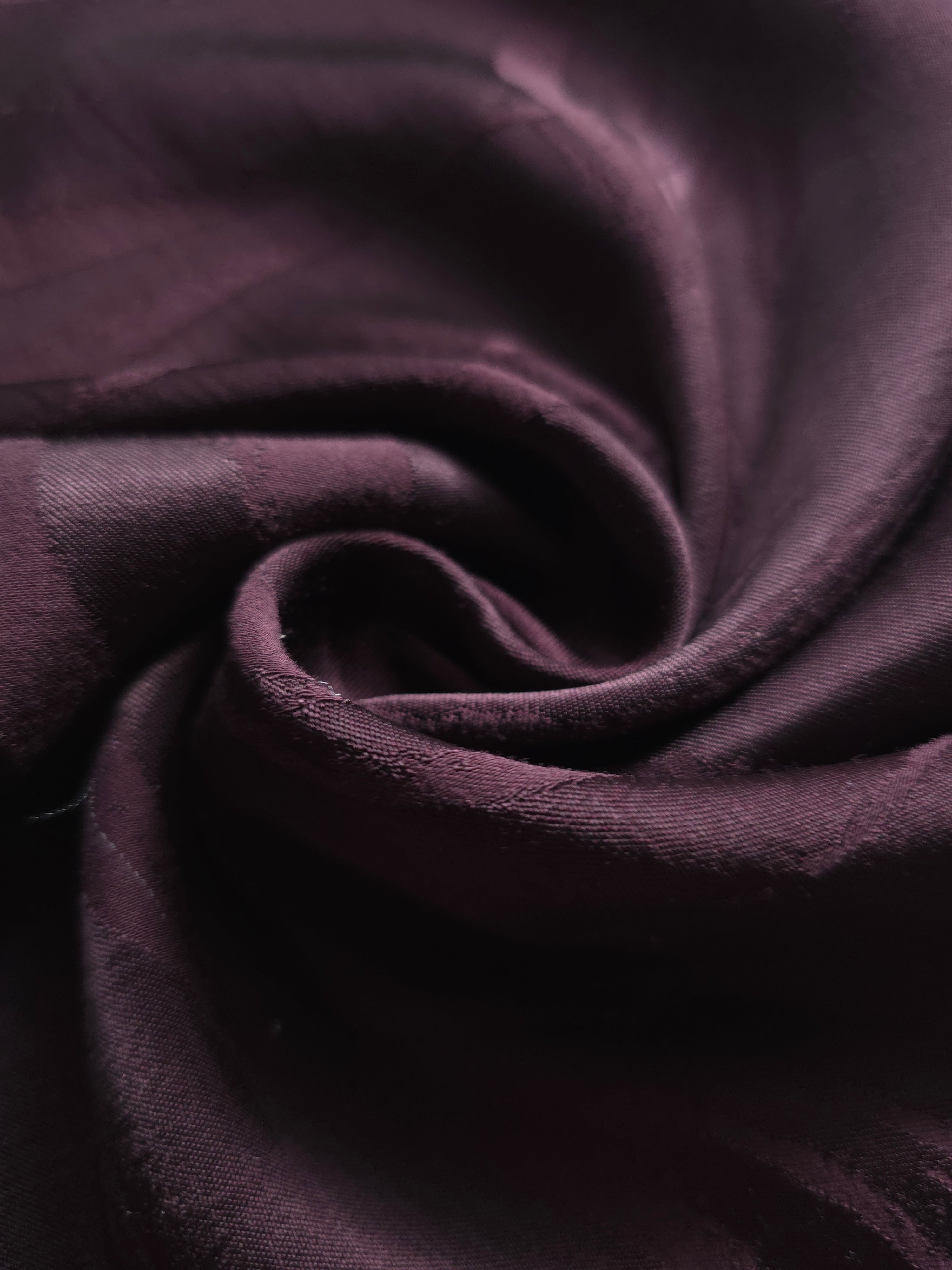 Close-up of draped Seaweed tonal jacquard fabric showing silky texture and fold detail