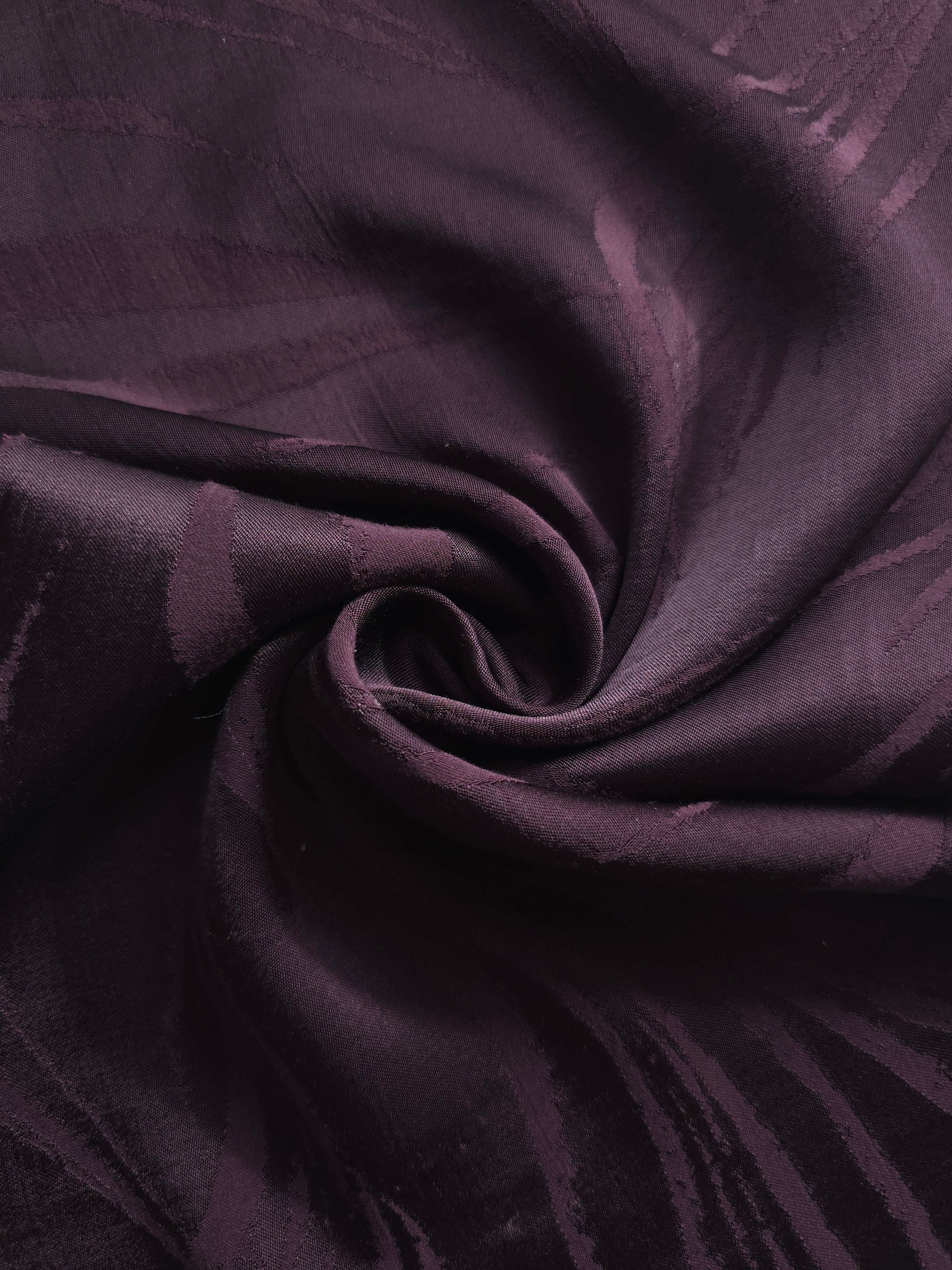 Seaweed self-jacquard tonal viscose fabric draped, showing silky fluid movement