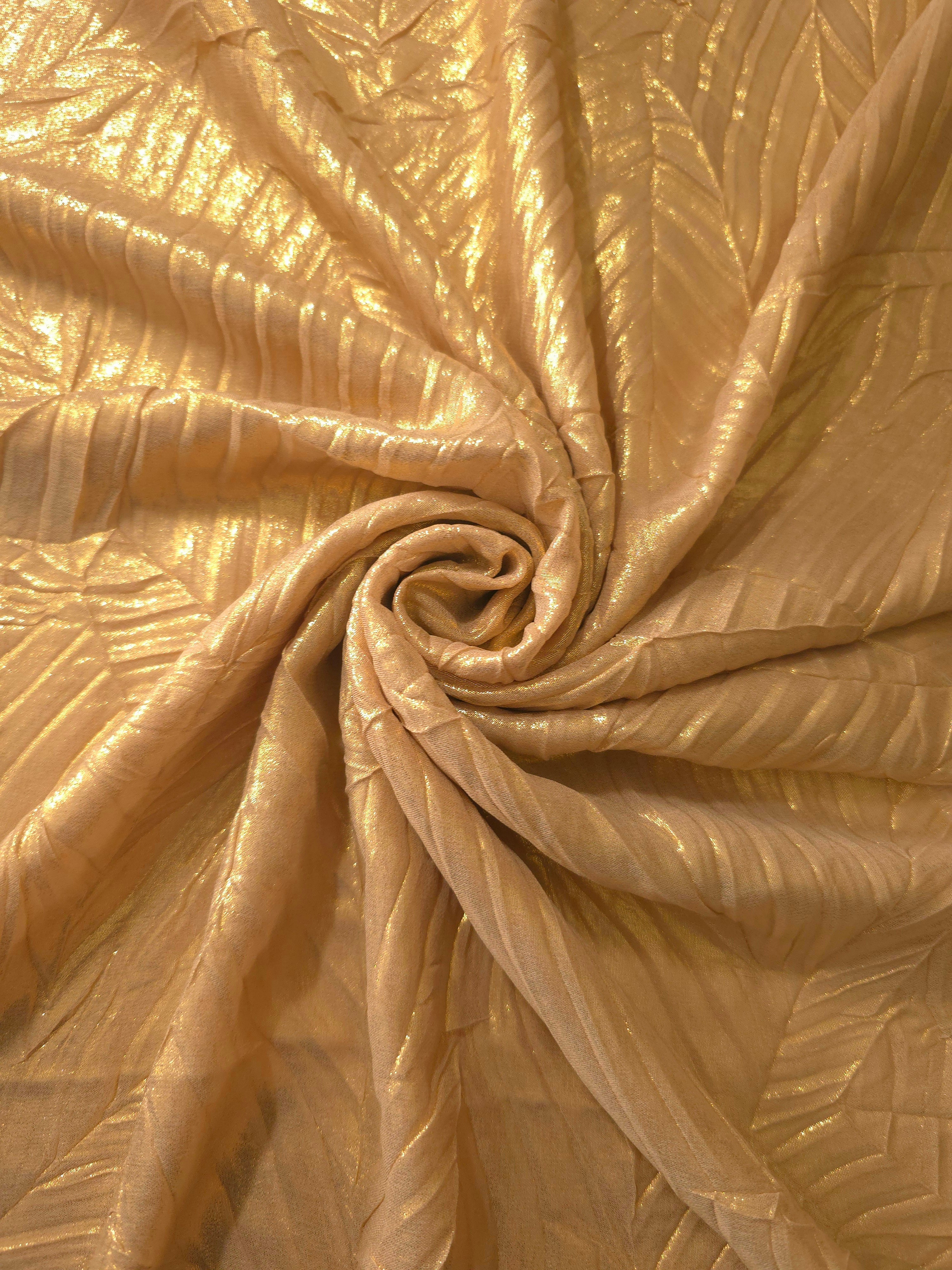 Bronze Gold shimmer plissé shown in a broad view, making the pleat pattern and visual rhythm clear for blouses, skirts and fashion-forward layering pieces.