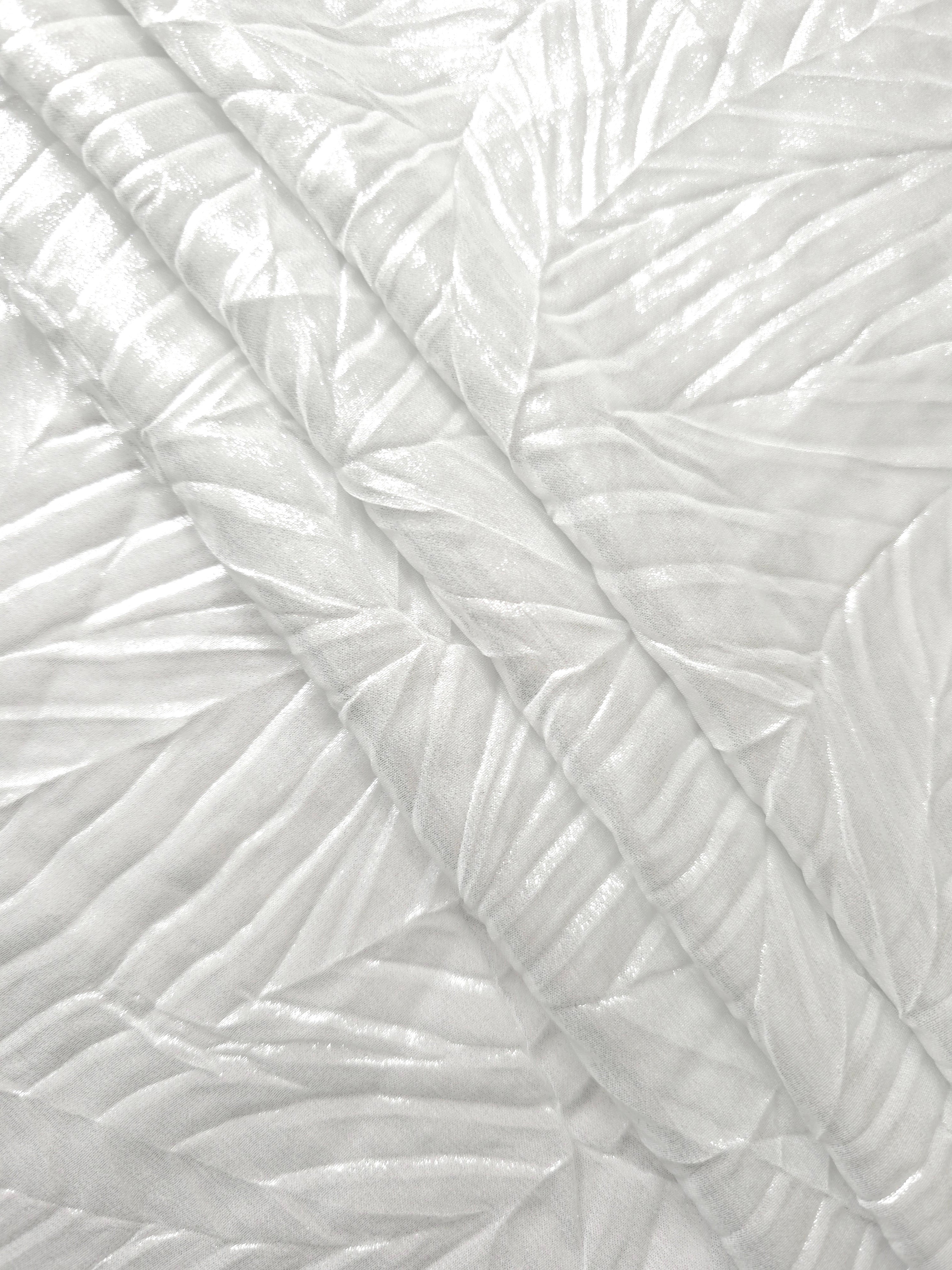 Frost White leaf-pattern plissé fabric in close detail, revealing the fine shimmer and dimensional pleat structure suited to bodice accents and fashion-forward blouses.