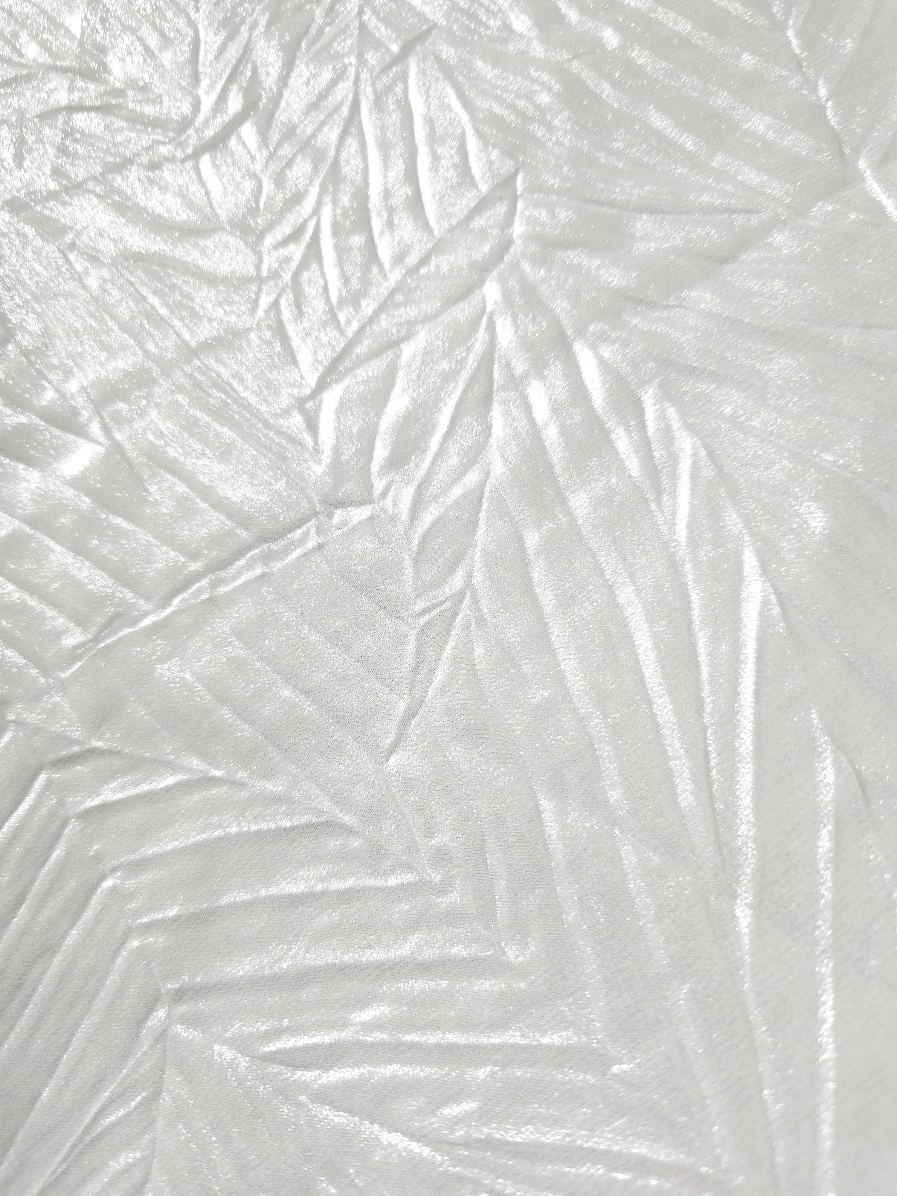 Soft drape of Frost White textured shimmer plissé reveals dimensional folds and shifting reflection for jumpsuits and fluid occasionwear.