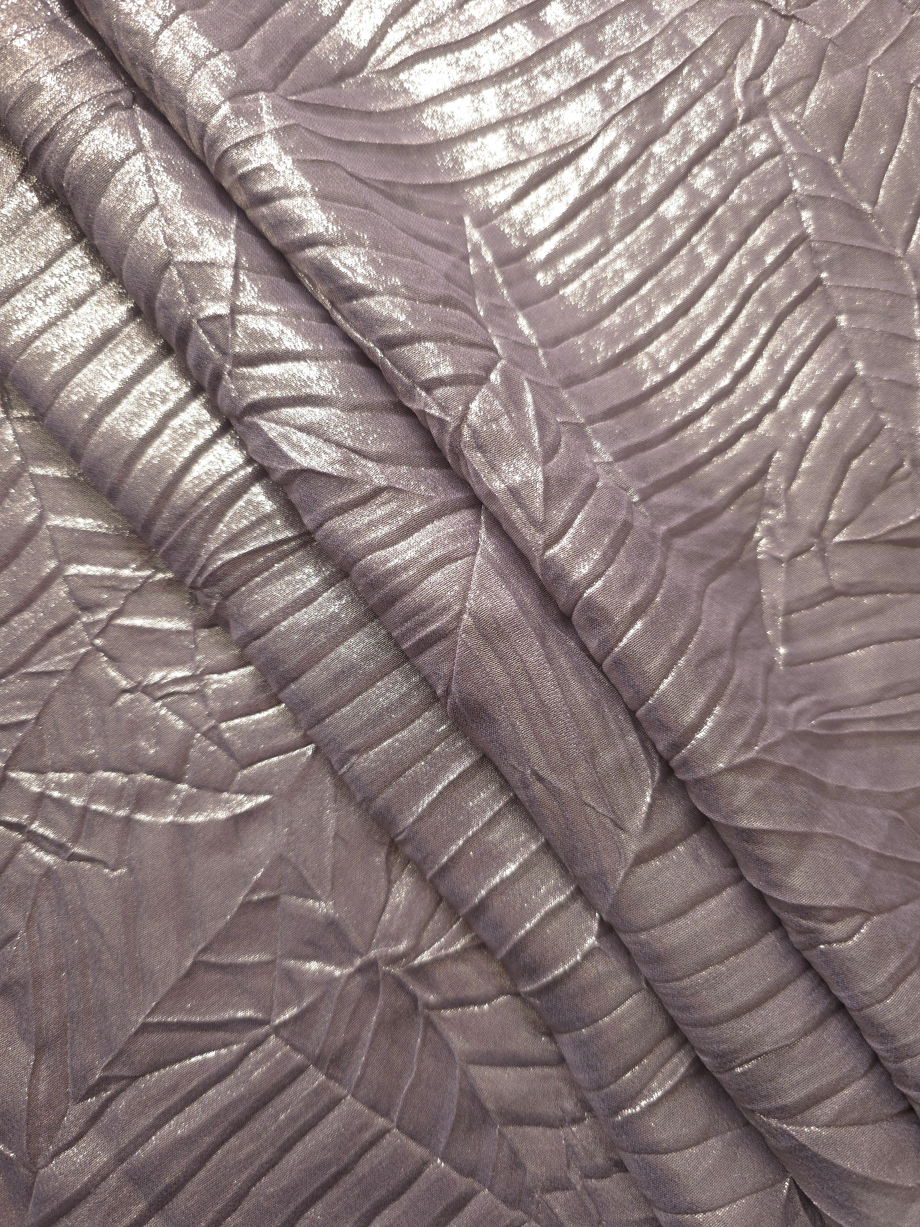 Lavender Taupe leaf-pattern plissé fabric in close detail, revealing the fine shimmer and dimensional pleat structure suited to bodice accents and fashion-forward blouses.