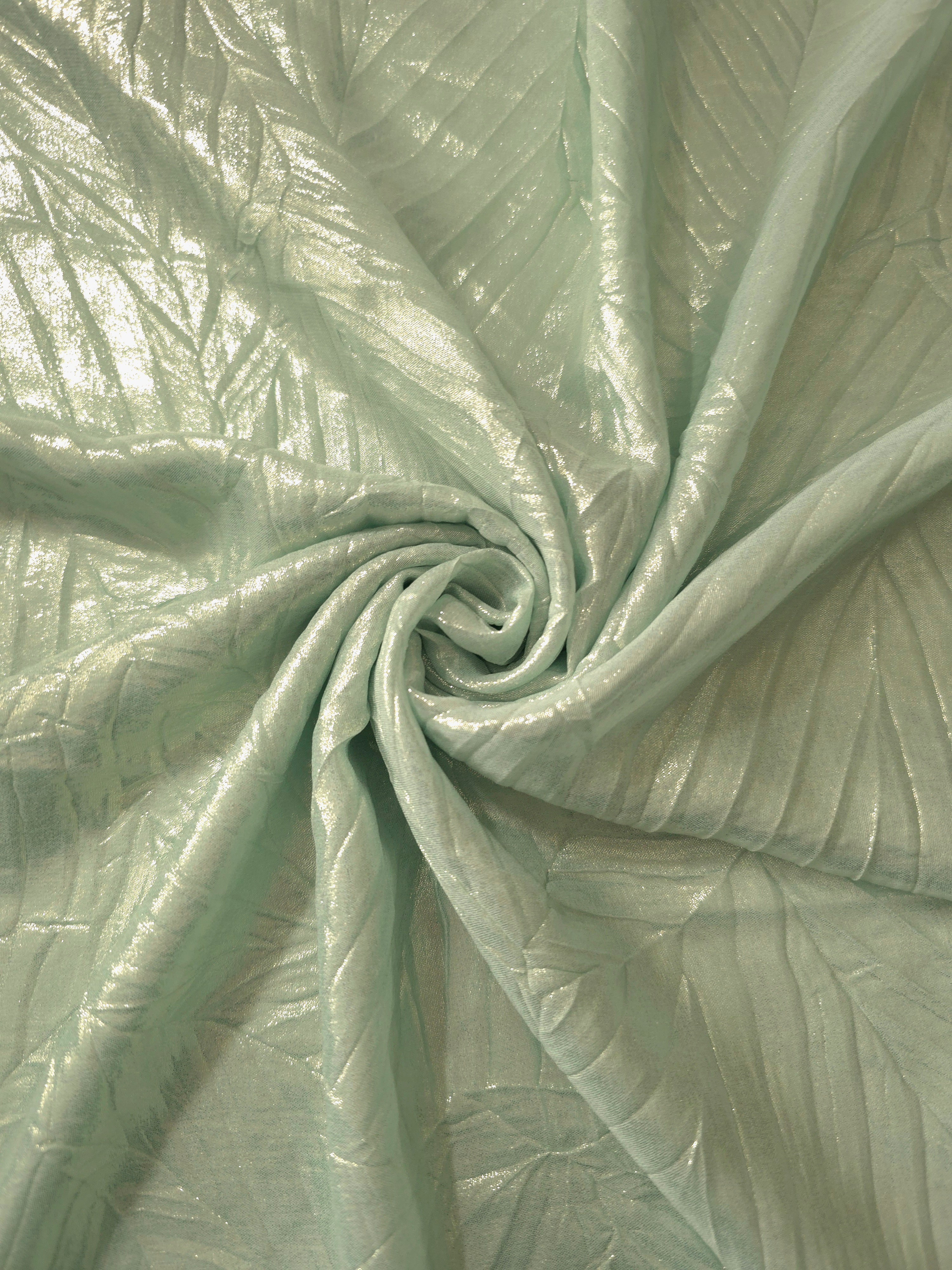 Pale Sage shimmer plissé shown in a broad view, making the pleat pattern and visual rhythm clear for blouses, skirts and fashion-forward layering pieces.