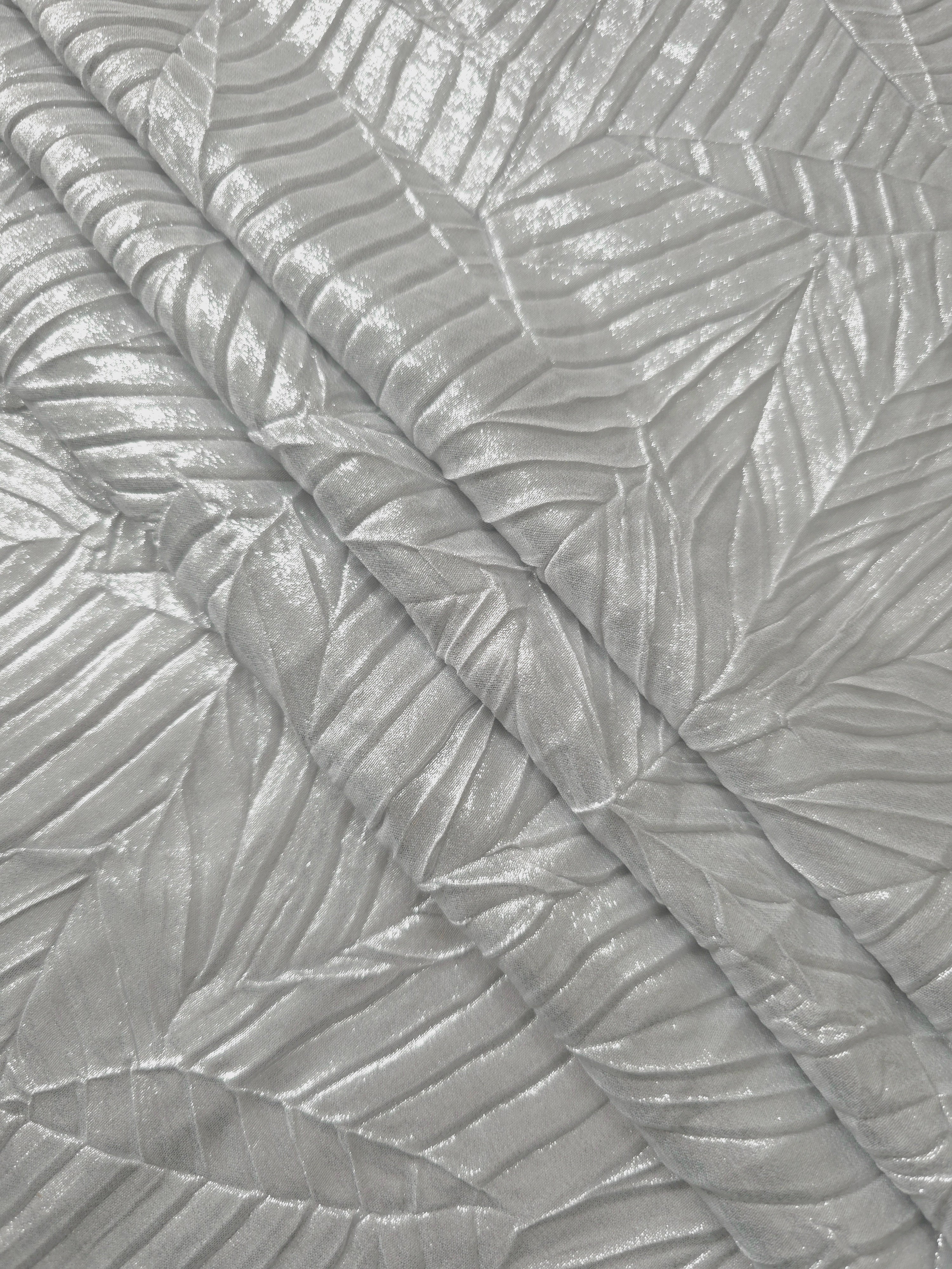 Pearl Silver leaf-pattern plissé fabric in close detail, revealing the fine shimmer and dimensional pleat structure suited to bodice accents and fashion-forward blouses.