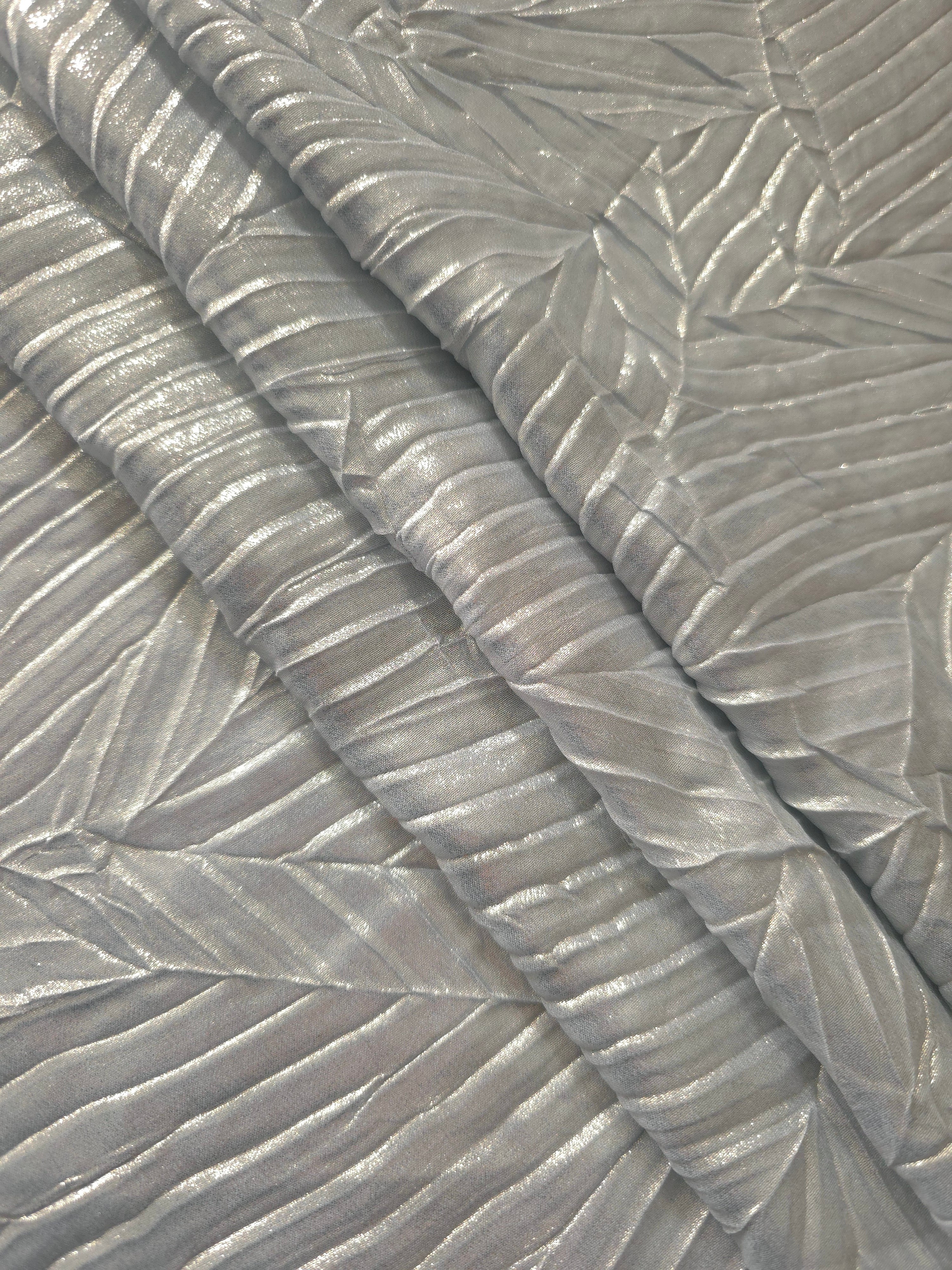 Pewter Gray leaf-pattern plissé fabric in close detail, revealing the fine shimmer and dimensional pleat structure suited to bodice accents and fashion-forward blouses.