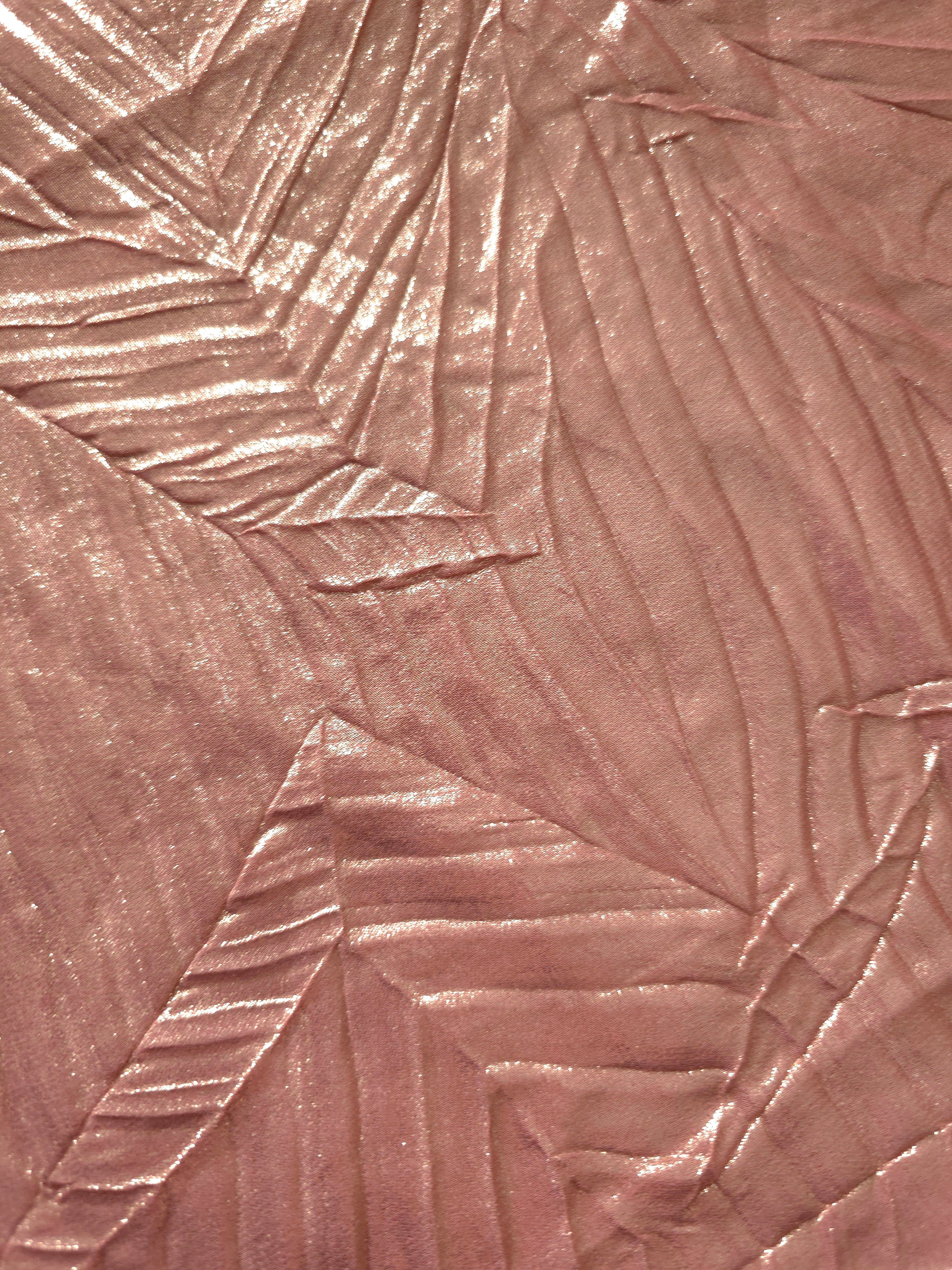 Soft drape of Rose Taupe textured shimmer plissé reveals dimensional folds and shifting reflection for jumpsuits and fluid occasionwear.