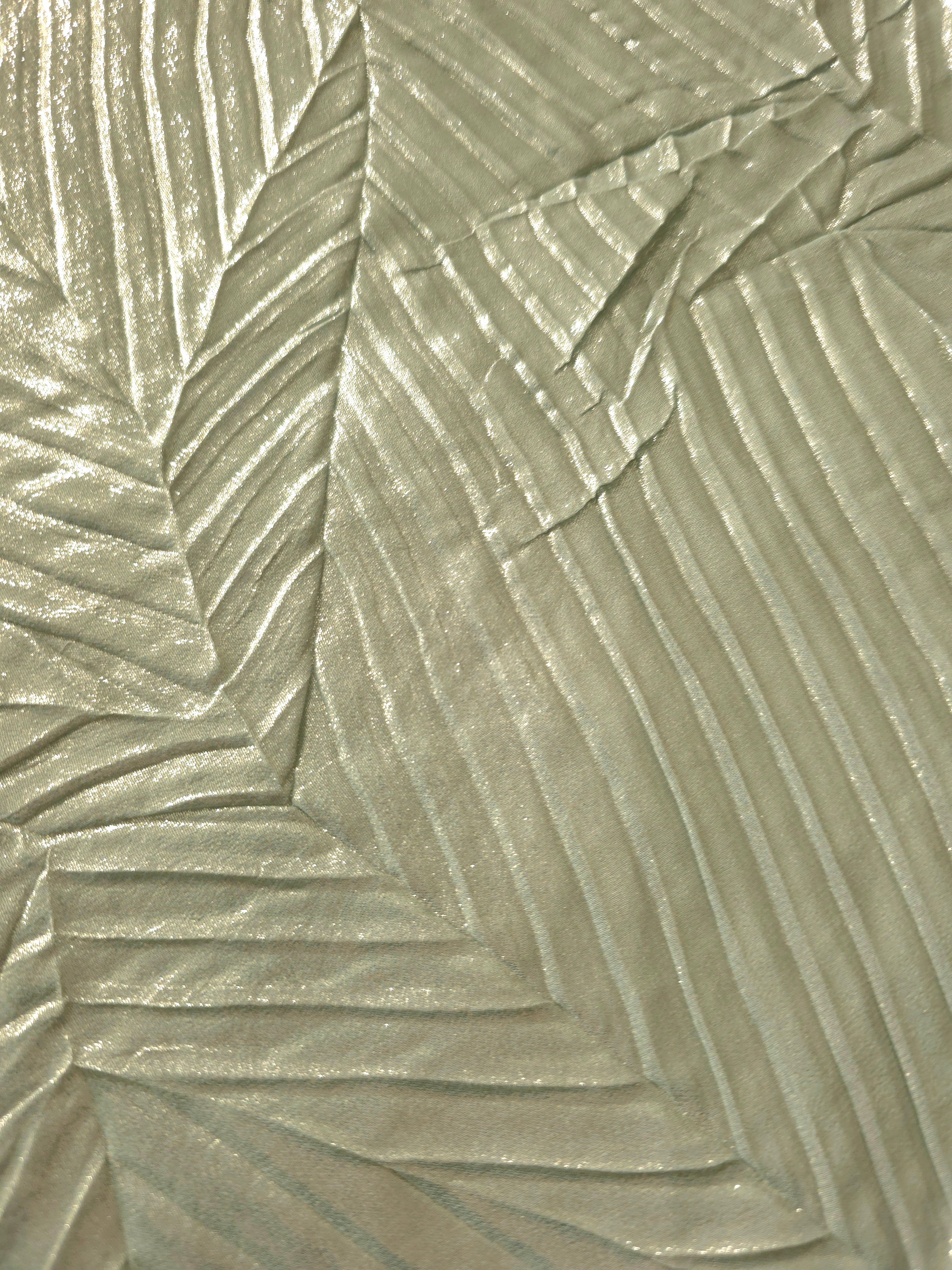 Soft drape of Sage Gray textured shimmer plissé reveals dimensional folds and shifting reflection for jumpsuits and fluid occasionwear.