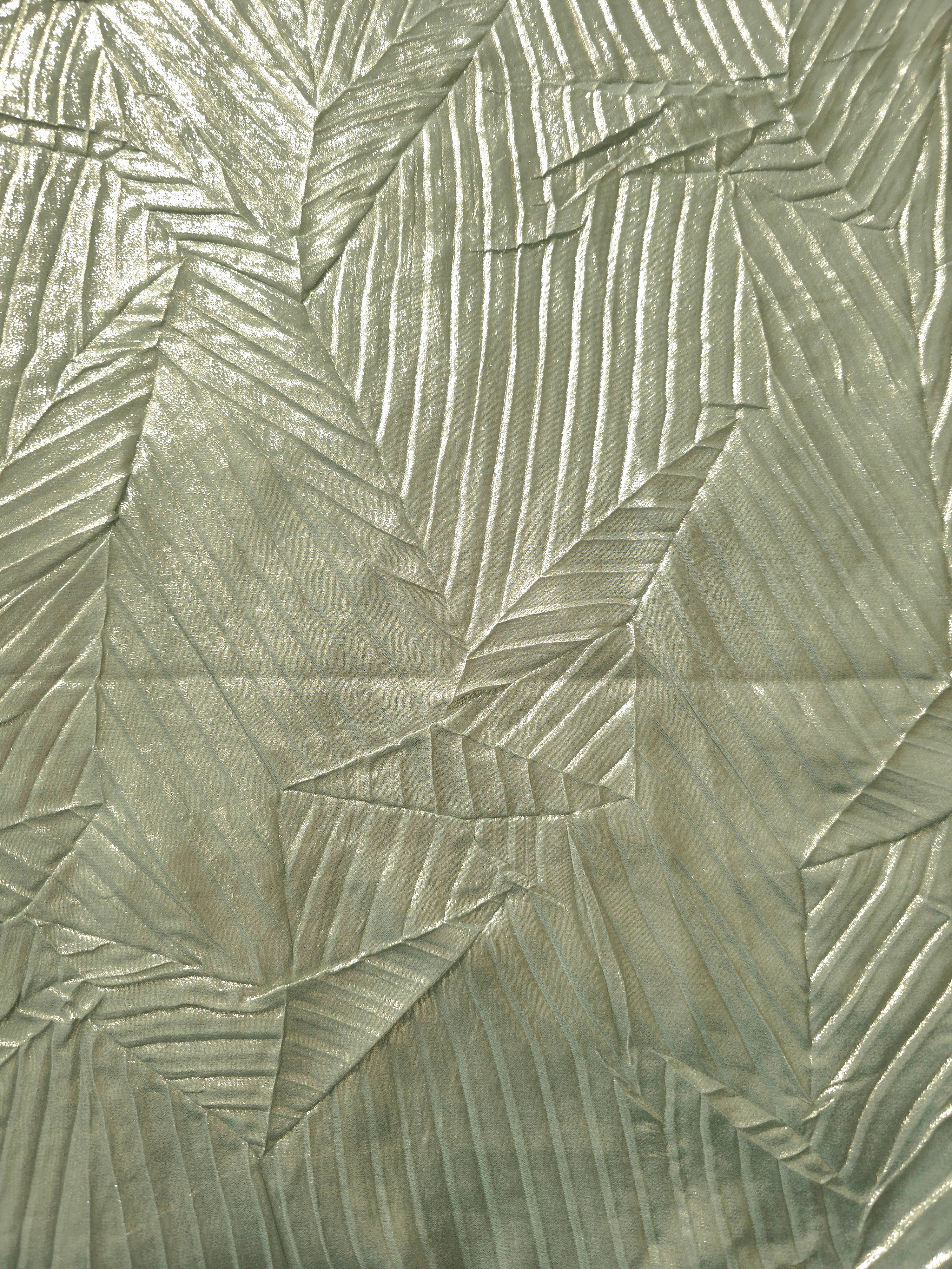 Surface detail of Sage Gray leaf-pattern plissé shimmer fabric showcases sculpted leaf-like pleats for evening clutches, garment accents and special-occasion pieces.