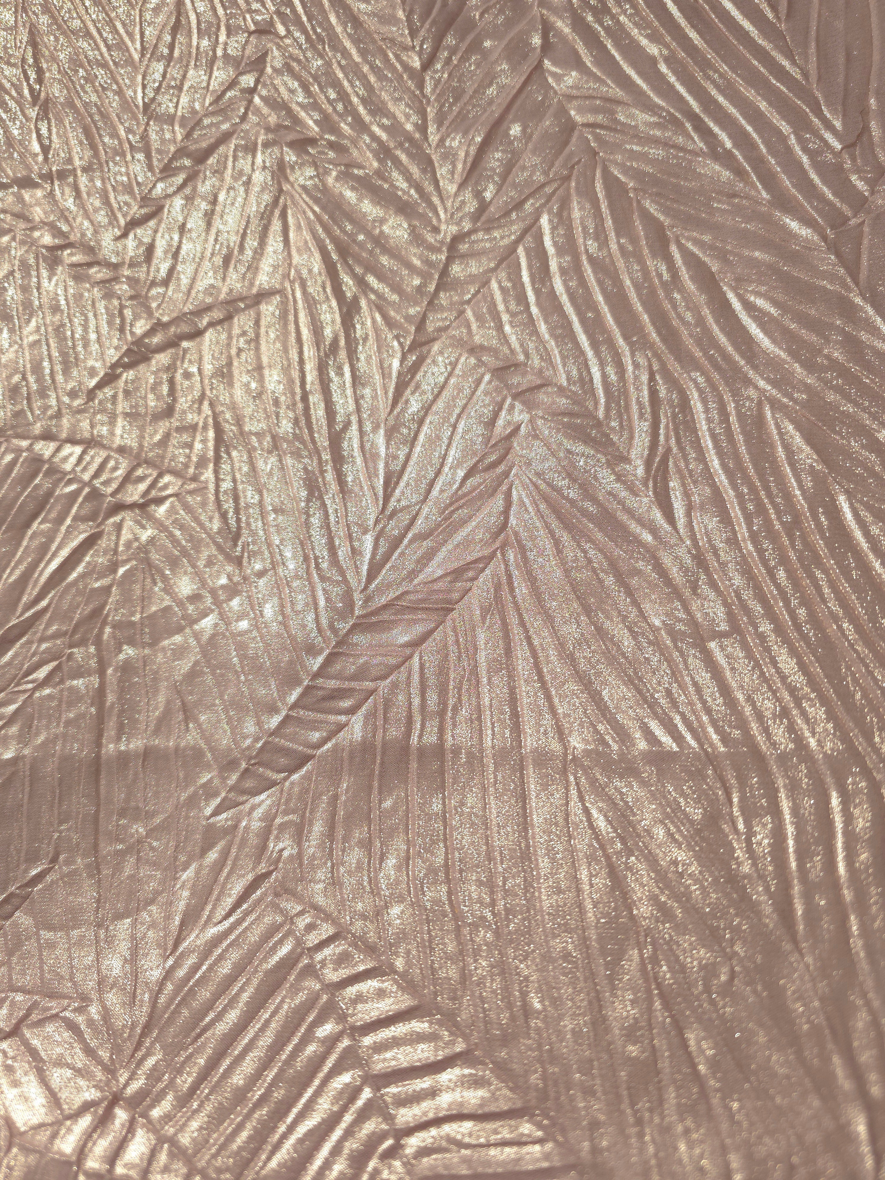 Surface detail of Soft Pink leaf-pattern plissé shimmer fabric showcases sculpted leaf-like pleats for evening clutches, garment accents and special-occasion pieces.