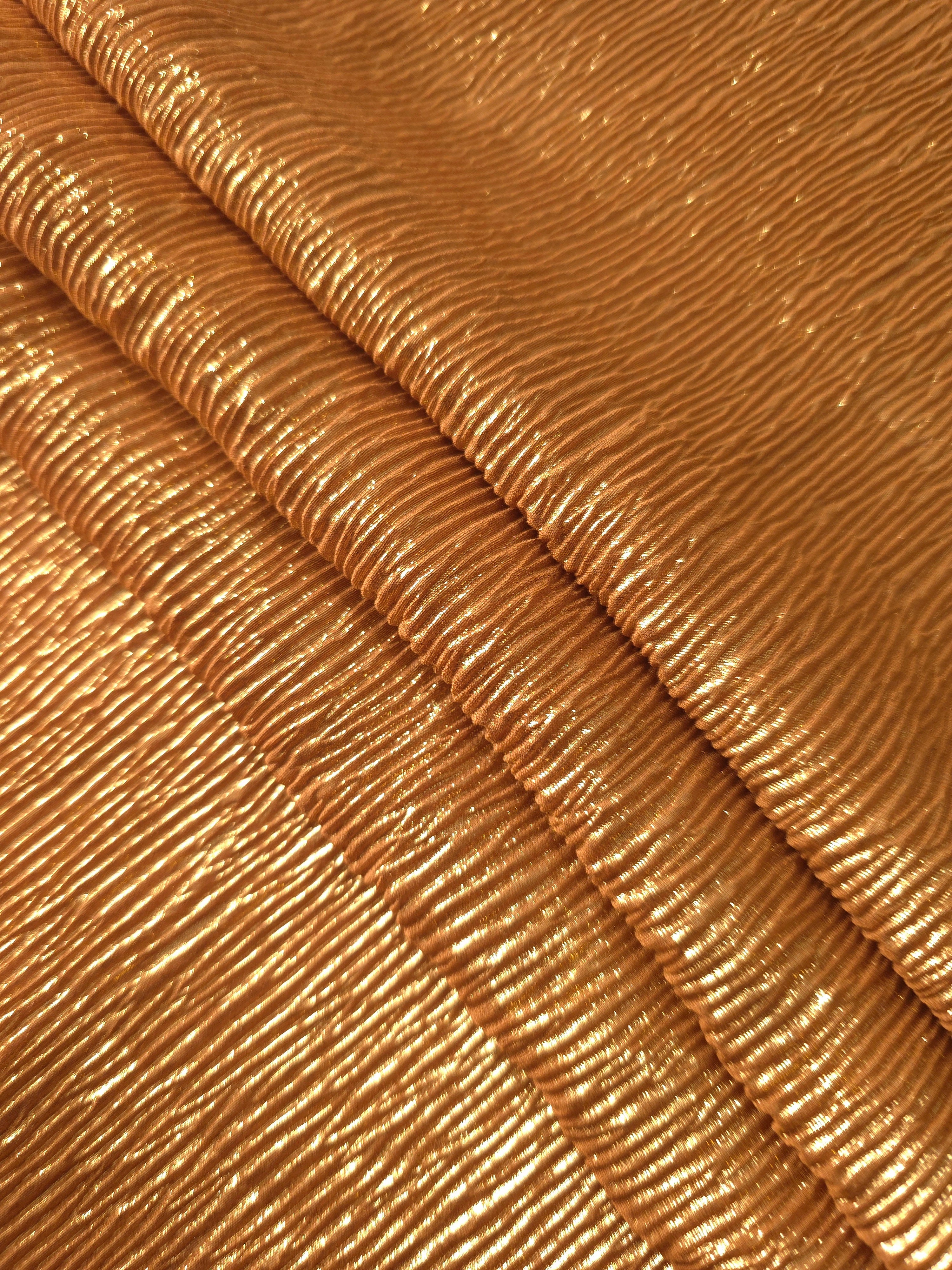 Burnished Copper fine mini-plissé fabric in close detail, revealing the fine shimmer and dimensional pleat structure suited to bodice accents and fashion-forward blouses.