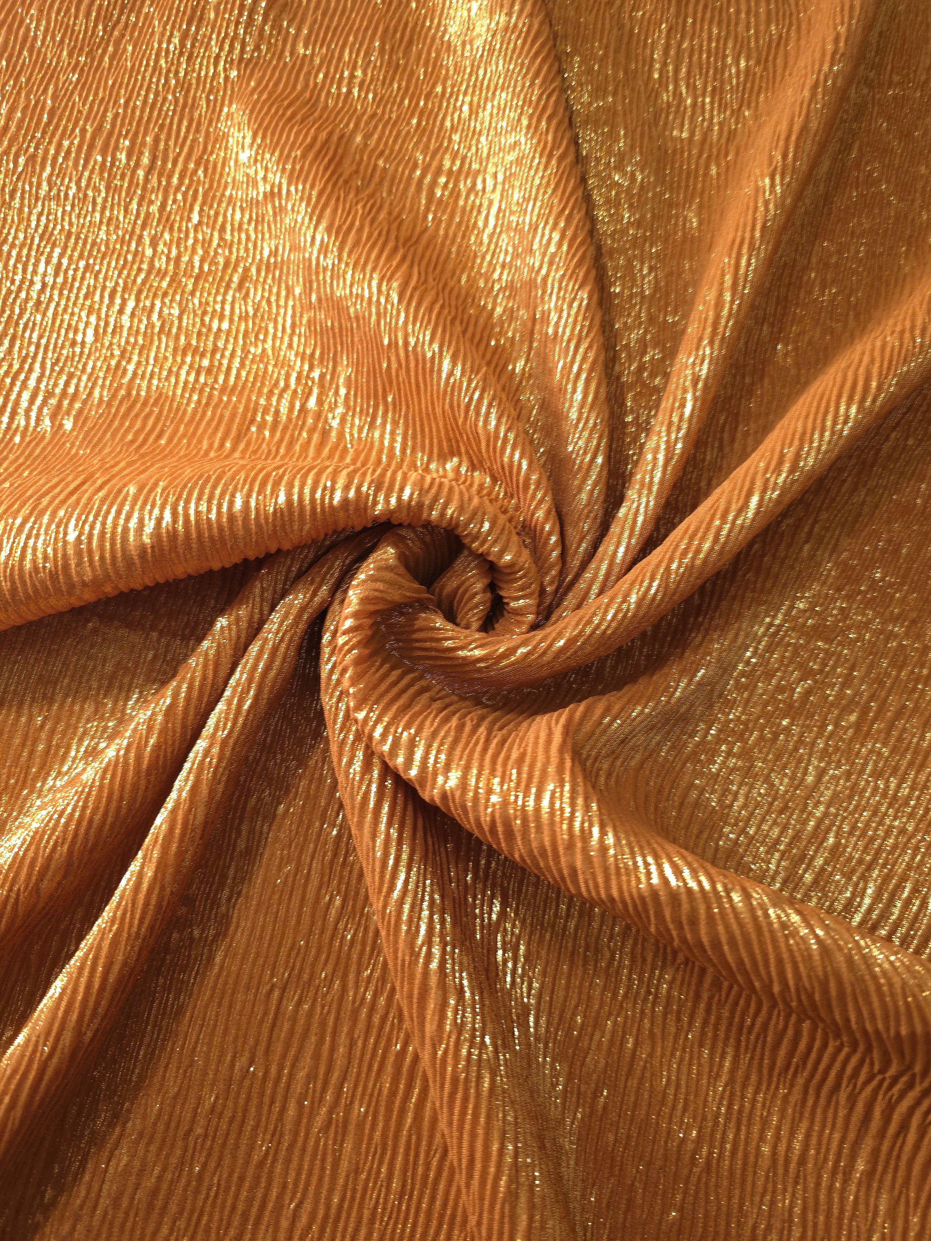 Burnished Copper shimmer plissé shown in a broad view, making the pleat pattern and visual rhythm clear for dancewear, stage costumes and longline silhouettes.