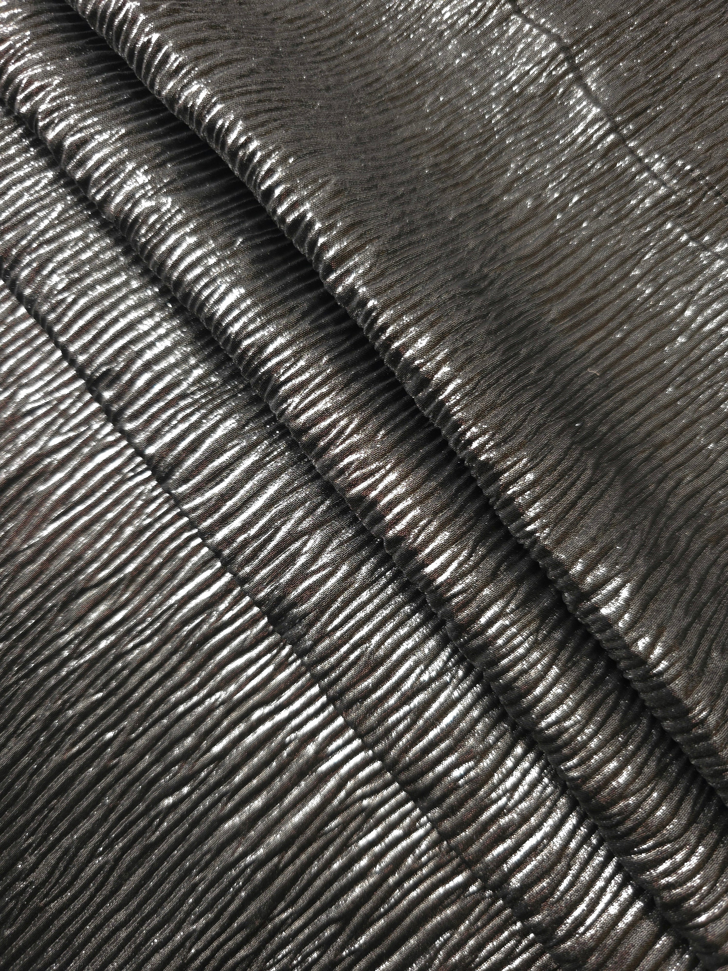 Graphite Gray fine mini-plissé fabric in close detail, revealing the fine shimmer and dimensional pleat structure suited to bodice accents and fashion-forward blouses.