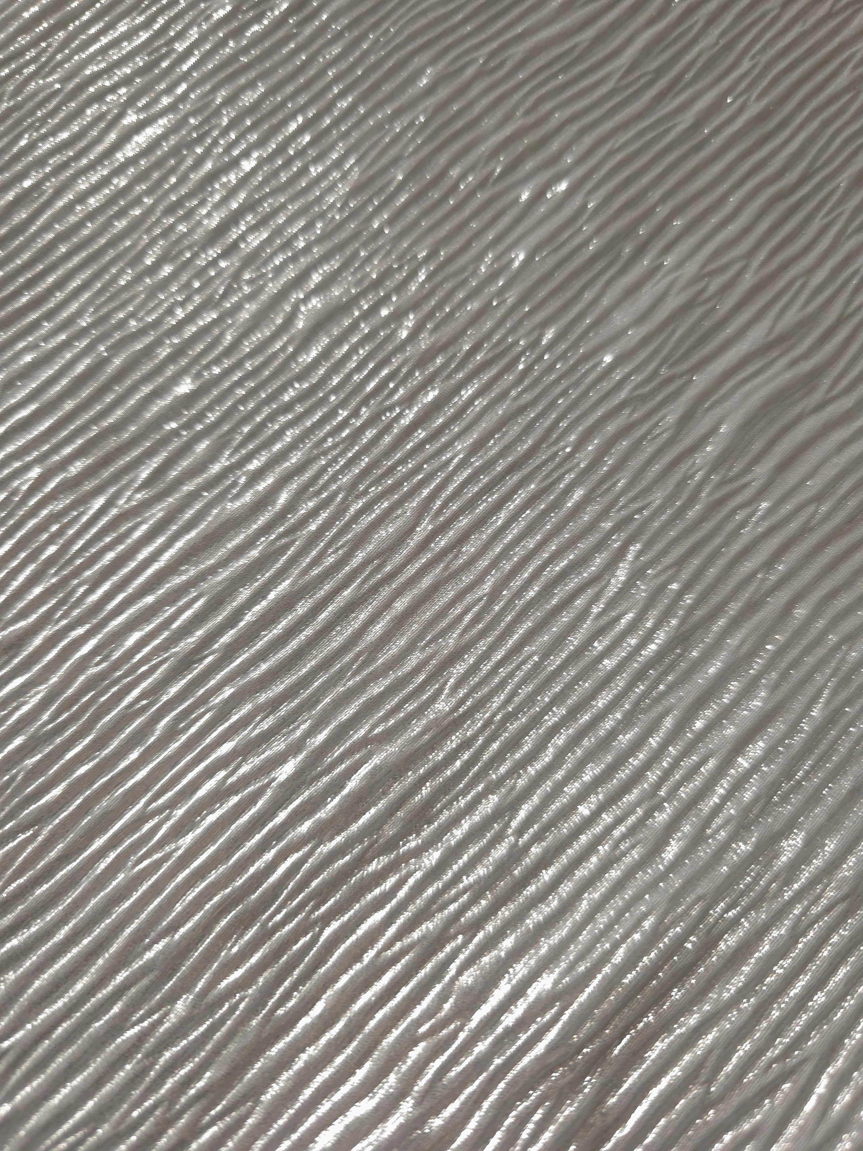 Pearl Silver fine mini-plissé fabric in close detail, revealing the fine shimmer and dimensional pleat structure suited to bodice accents and fashion-forward blouses.