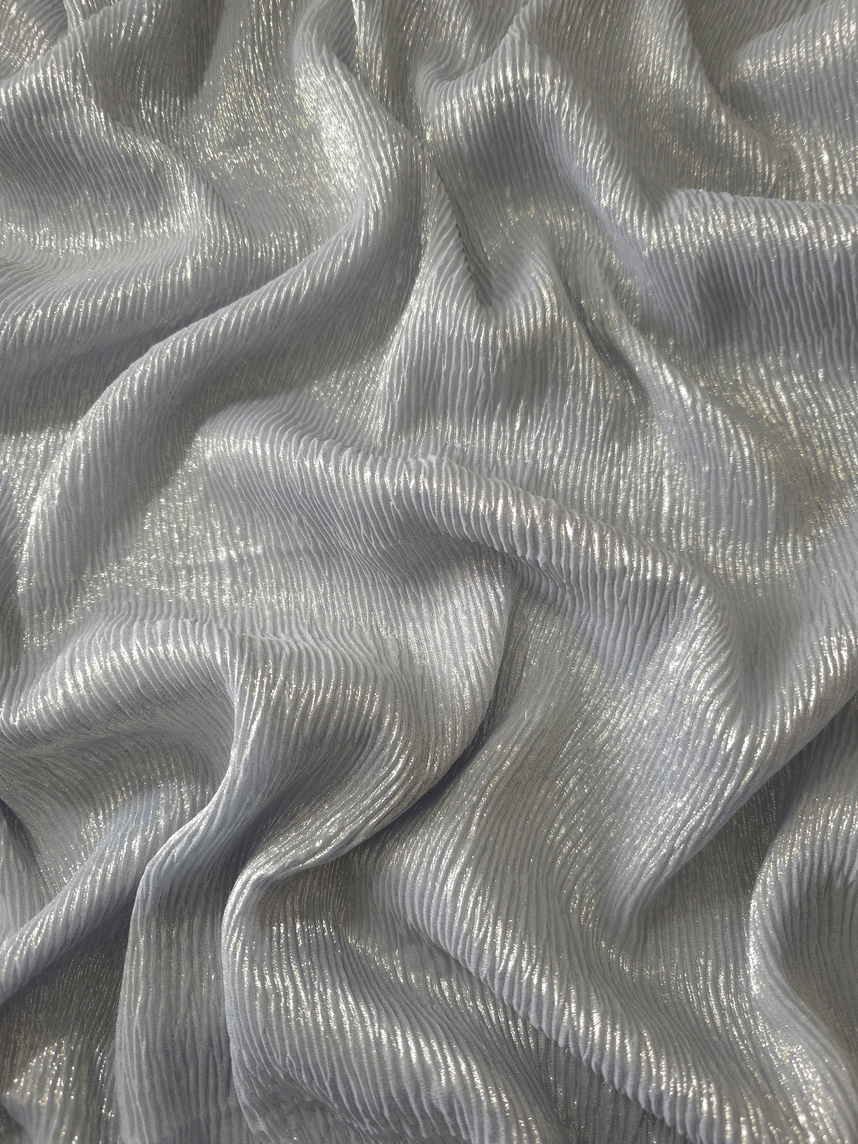 Flowing drape of Pewter Gray fine mini-plissé shimmer fabric, showing narrow micro-pleated texture and light-catching movement for evening gowns and flowing maxi skirts.
