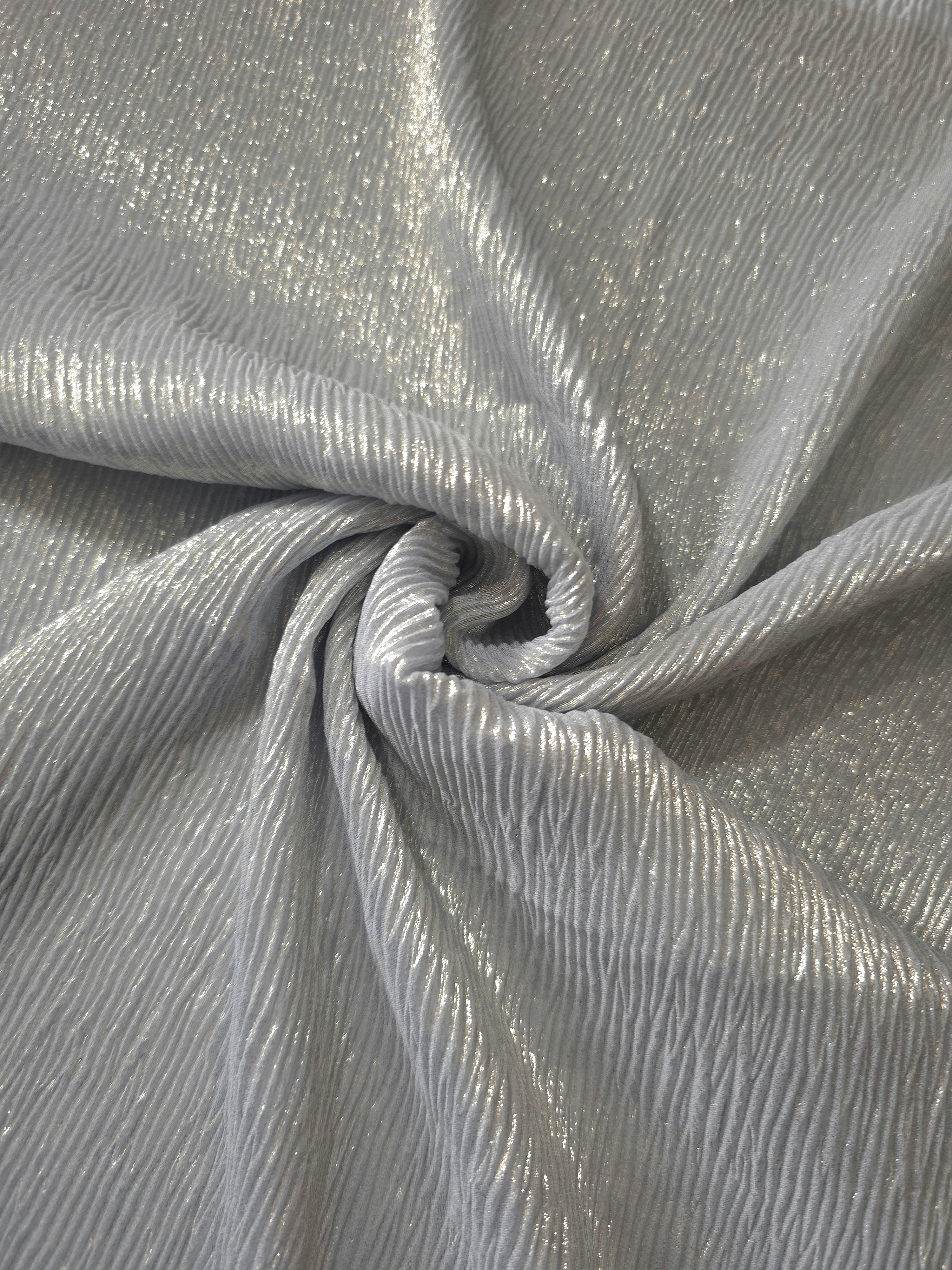 Fold detail of Pewter Gray fine mini-plissé fabric demonstrates how the textured surface builds depth for stagewear and layered fashion details.