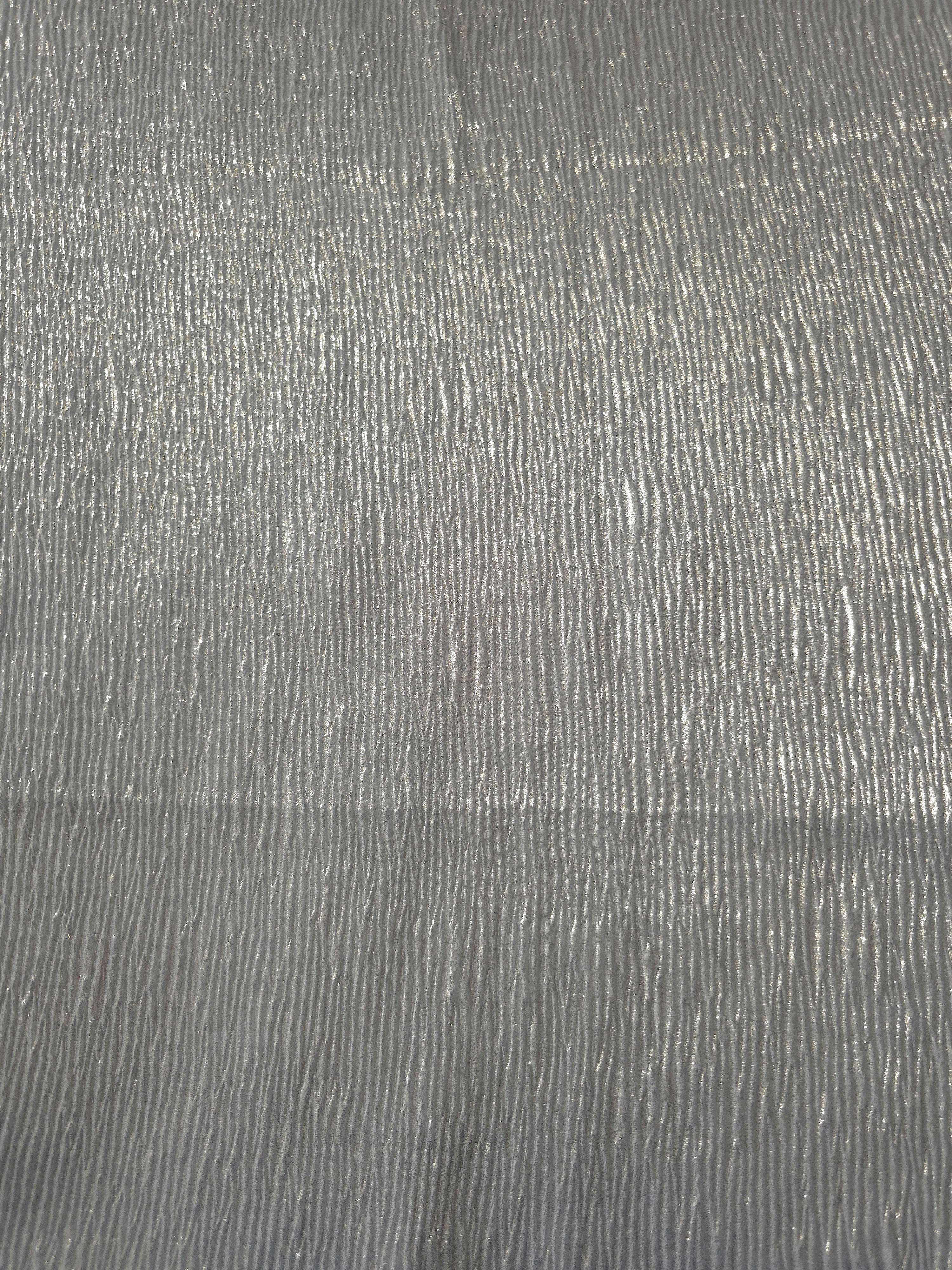 Surface detail of Pewter Gray fine mini-plissé shimmer fabric showcases narrow micro-pleated texture for evening clutches, garment accents and special-occasion pieces.