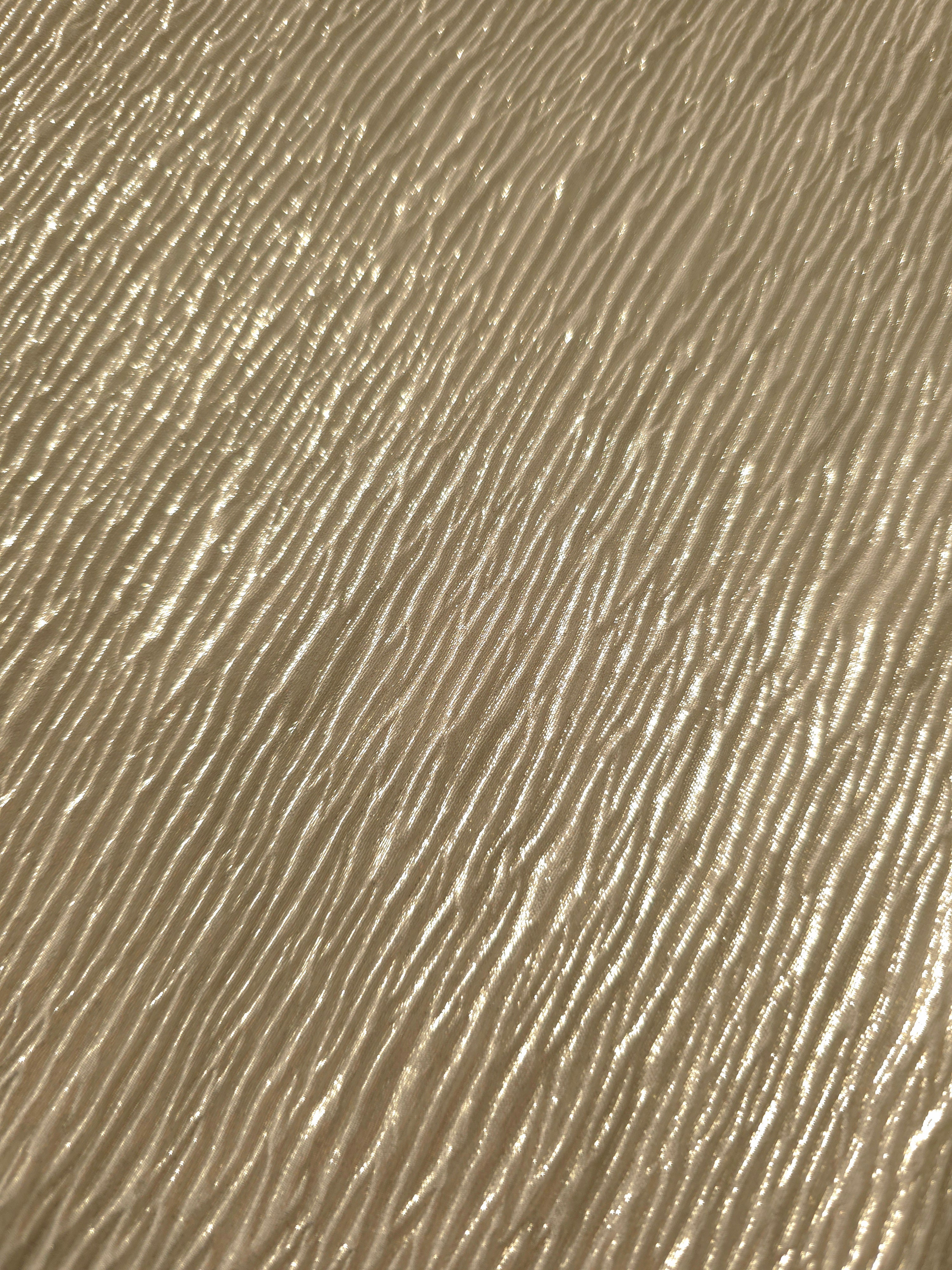 Soft Champagne fine mini-plissé fabric in close detail, revealing the fine shimmer and dimensional pleat structure suited to bodice accents and fashion-forward blouses.