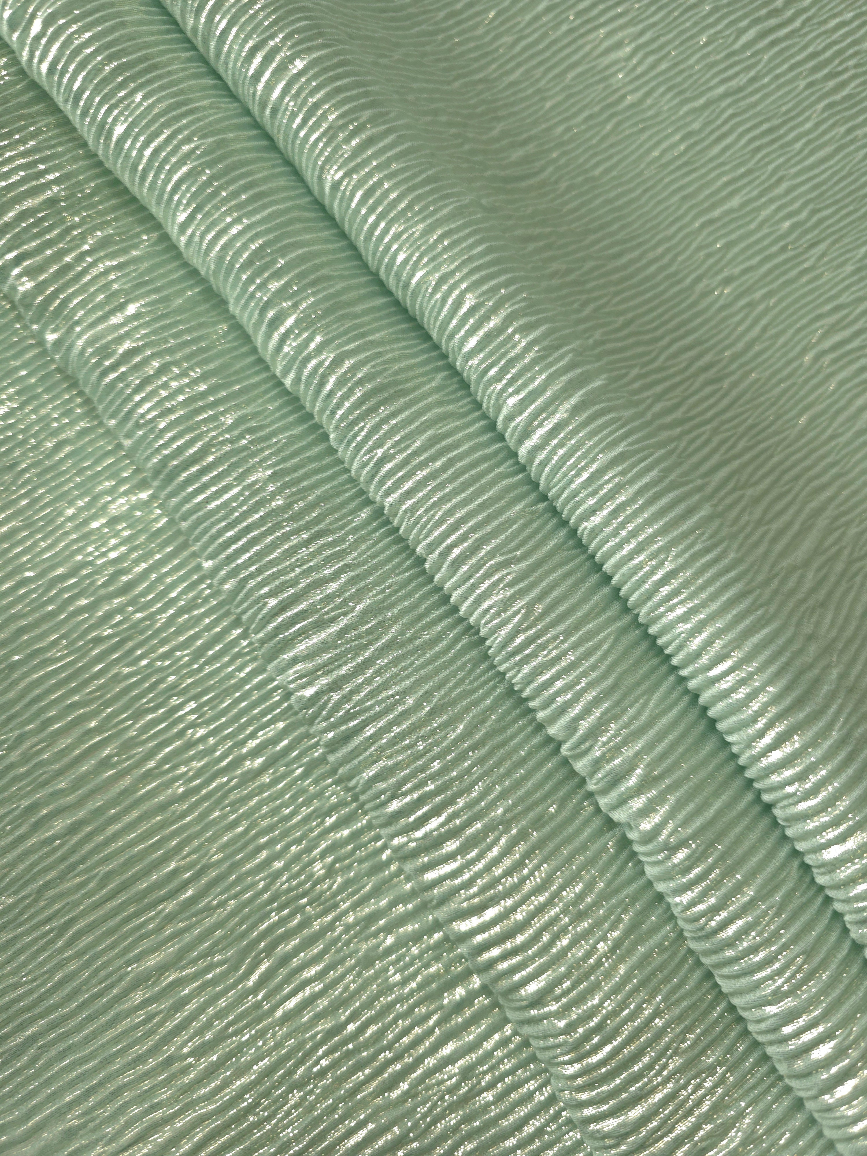 Soft Sage fine mini-plissé fabric in close detail, revealing the fine shimmer and dimensional pleat structure suited to bodice accents and fashion-forward blouses.