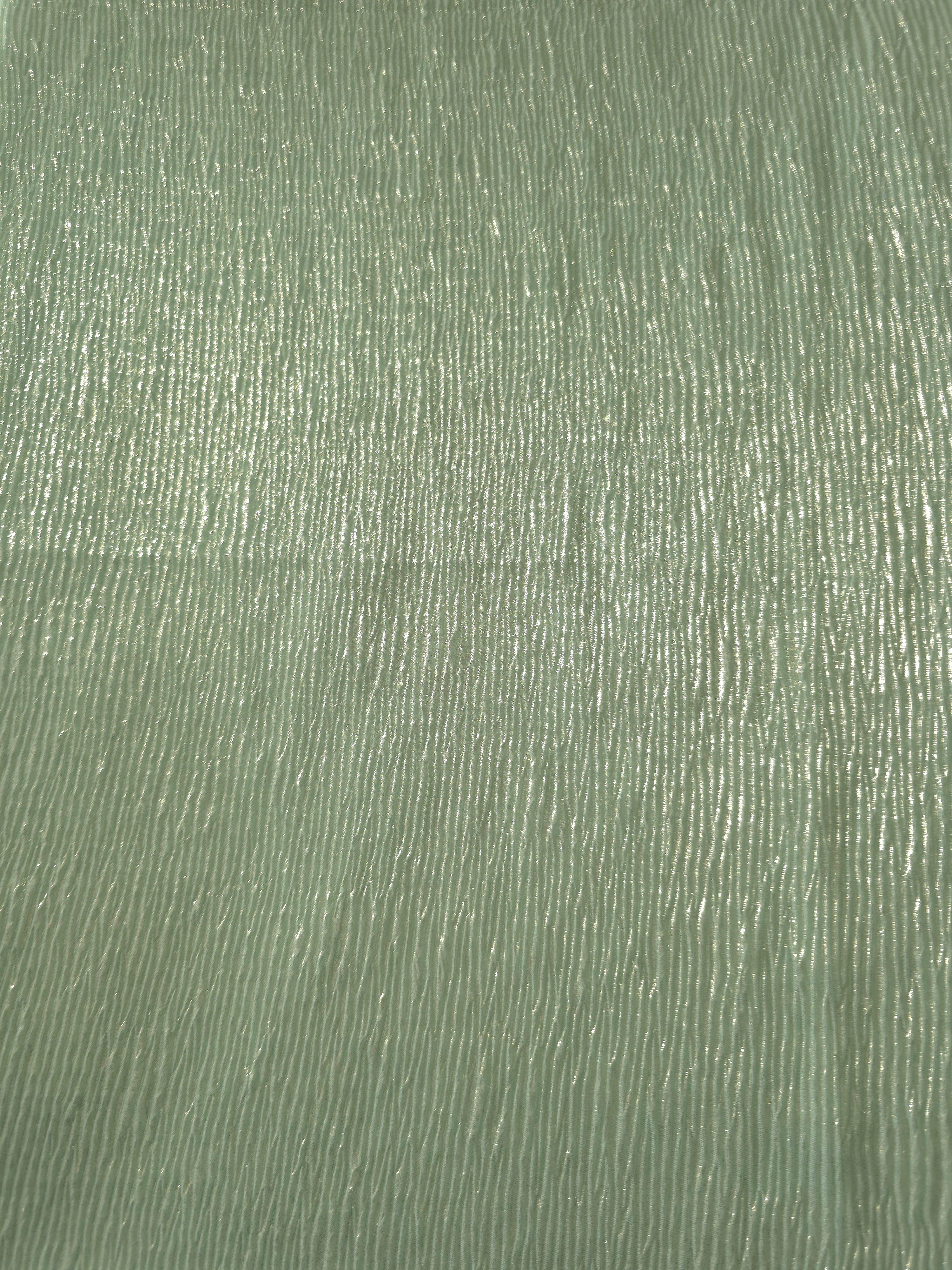 Surface detail of Soft Sage fine mini-plissé shimmer fabric showcases narrow micro-pleated texture for evening clutches, garment accents and special-occasion pieces.