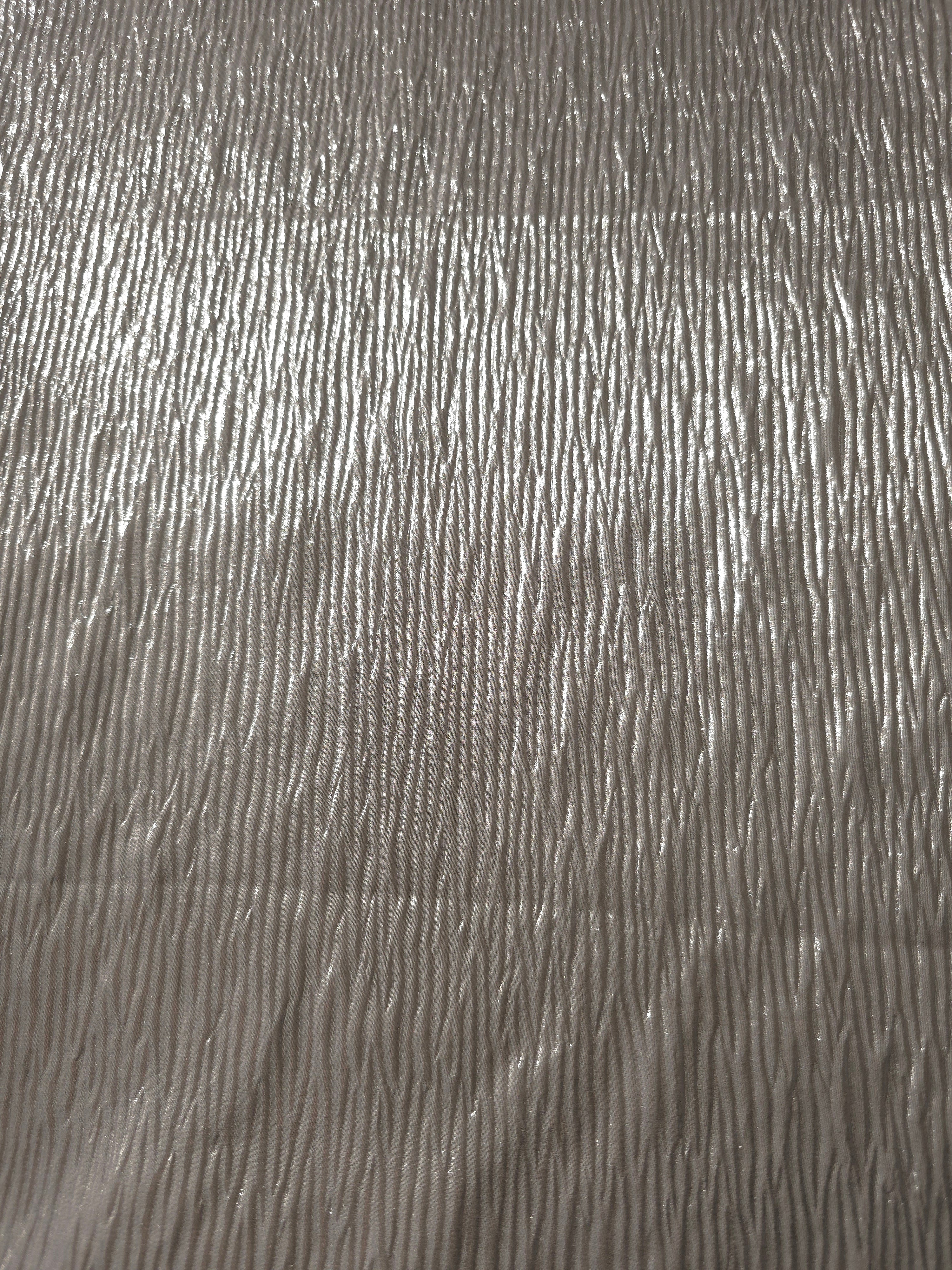 Surface detail of Steel Silver fine mini-plissé shimmer fabric showcases narrow micro-pleated texture for evening clutches, garment accents and special-occasion pieces.