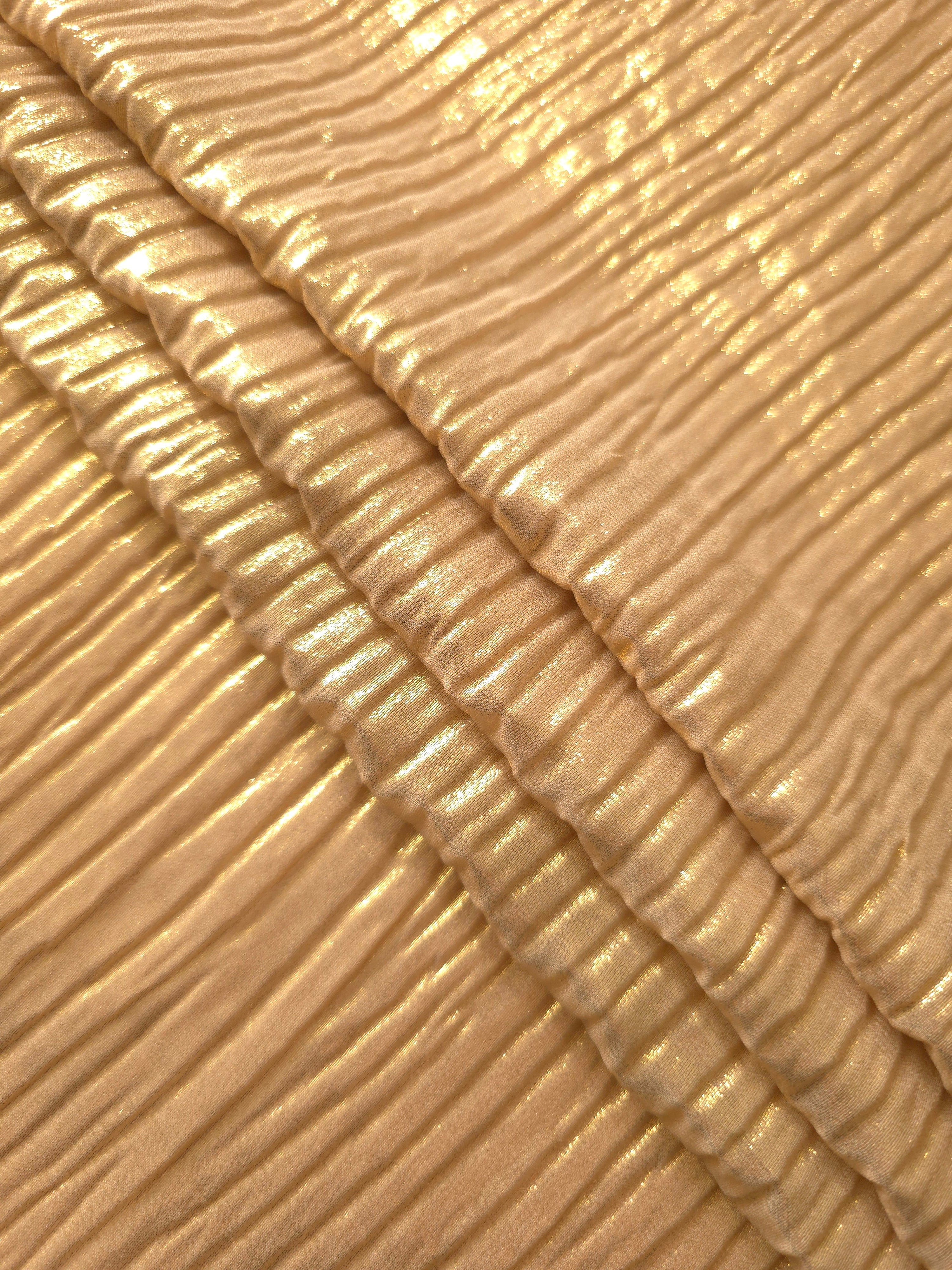 Golden Beige classic plissé fabric in close detail, revealing the fine shimmer and dimensional pleat structure suited to bodice accents and fashion-forward blouses.