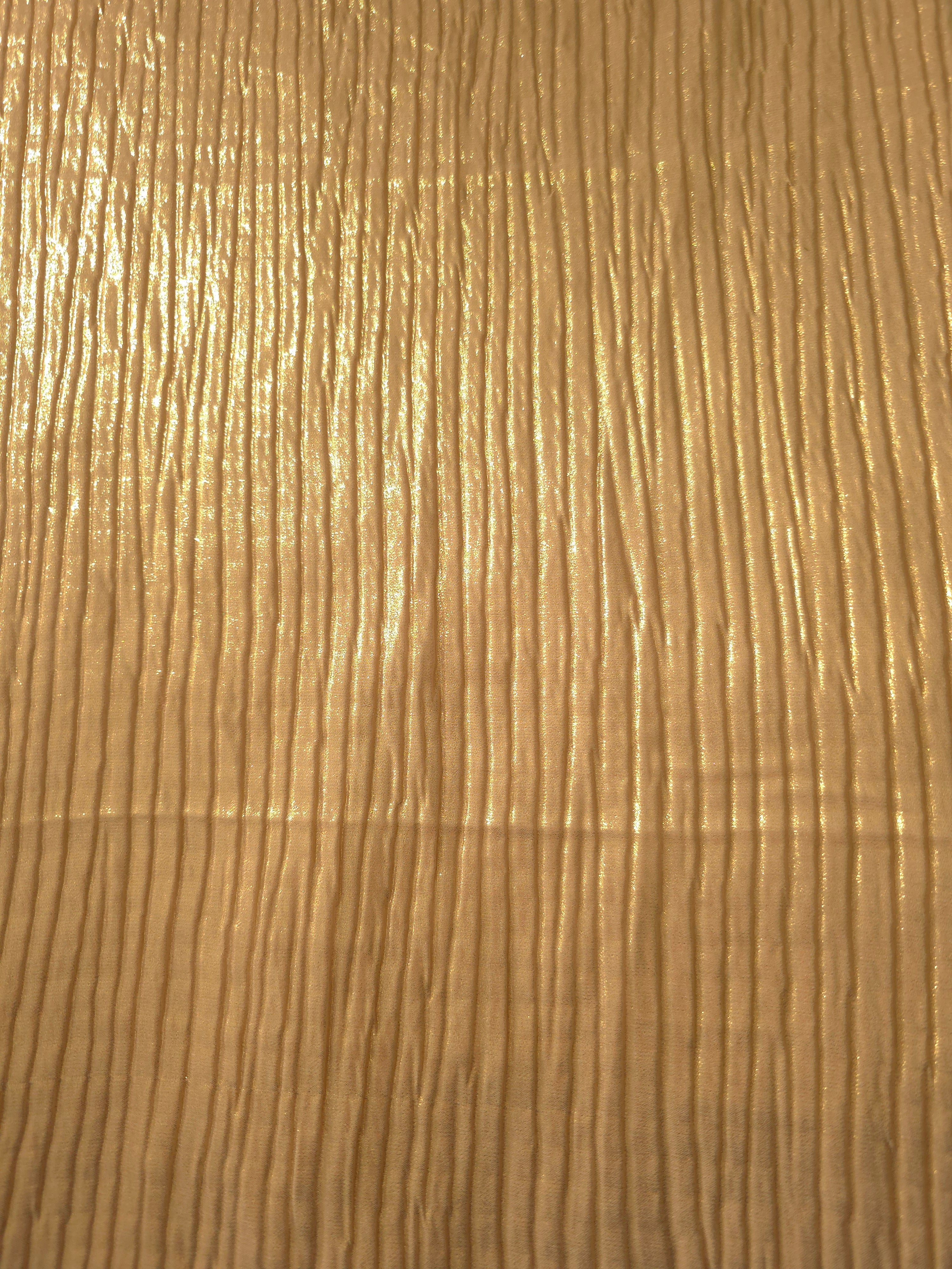 Surface detail of Golden Beige classic plissé shimmer fabric showcases regular pleated texture for evening clutches, garment accents and special-occasion pieces.