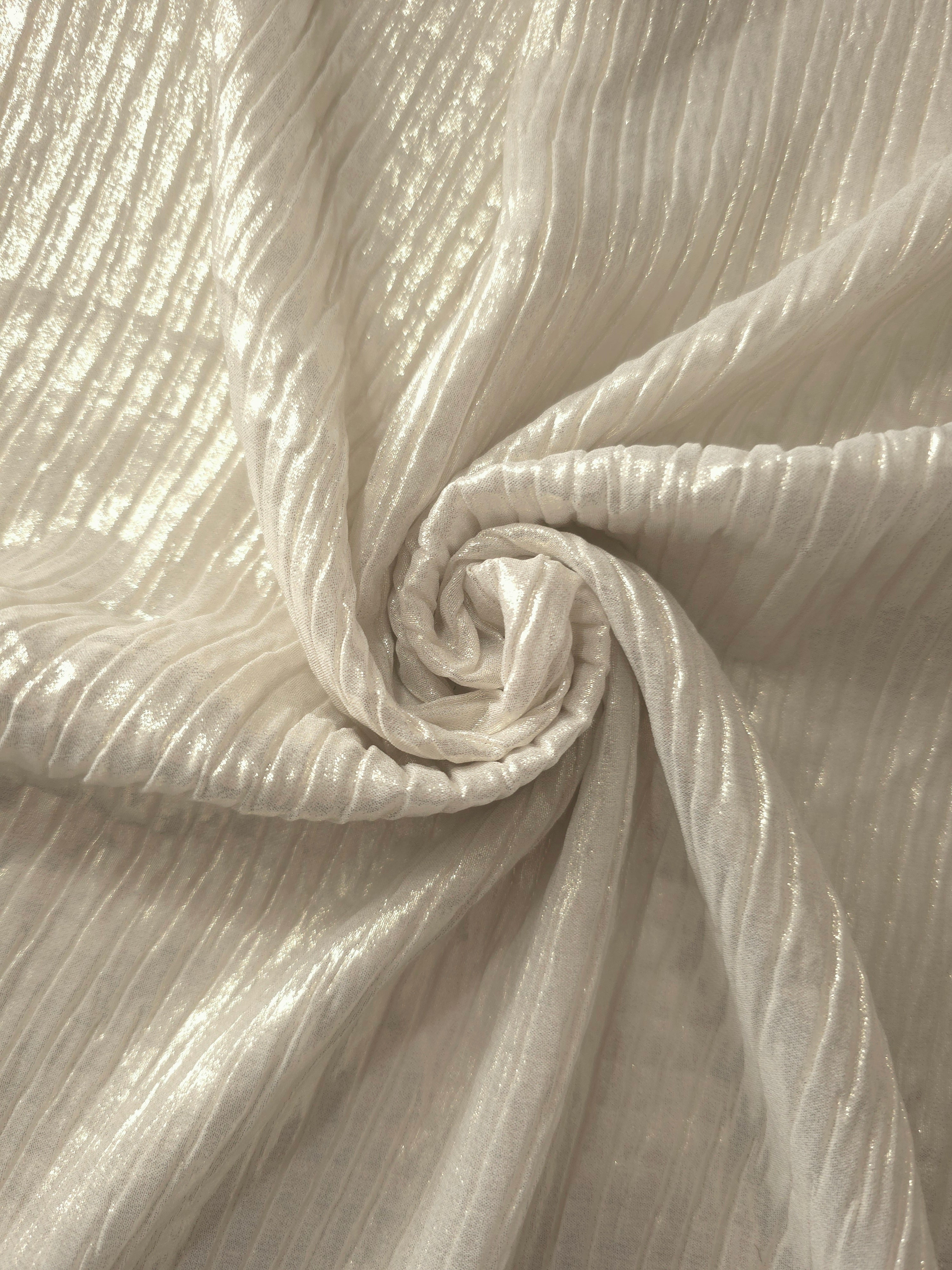 Ivory Cream shimmer plissé shown in a broad view, making the pleat pattern and visual rhythm clear for blouses, skirts and fashion-forward layering pieces.