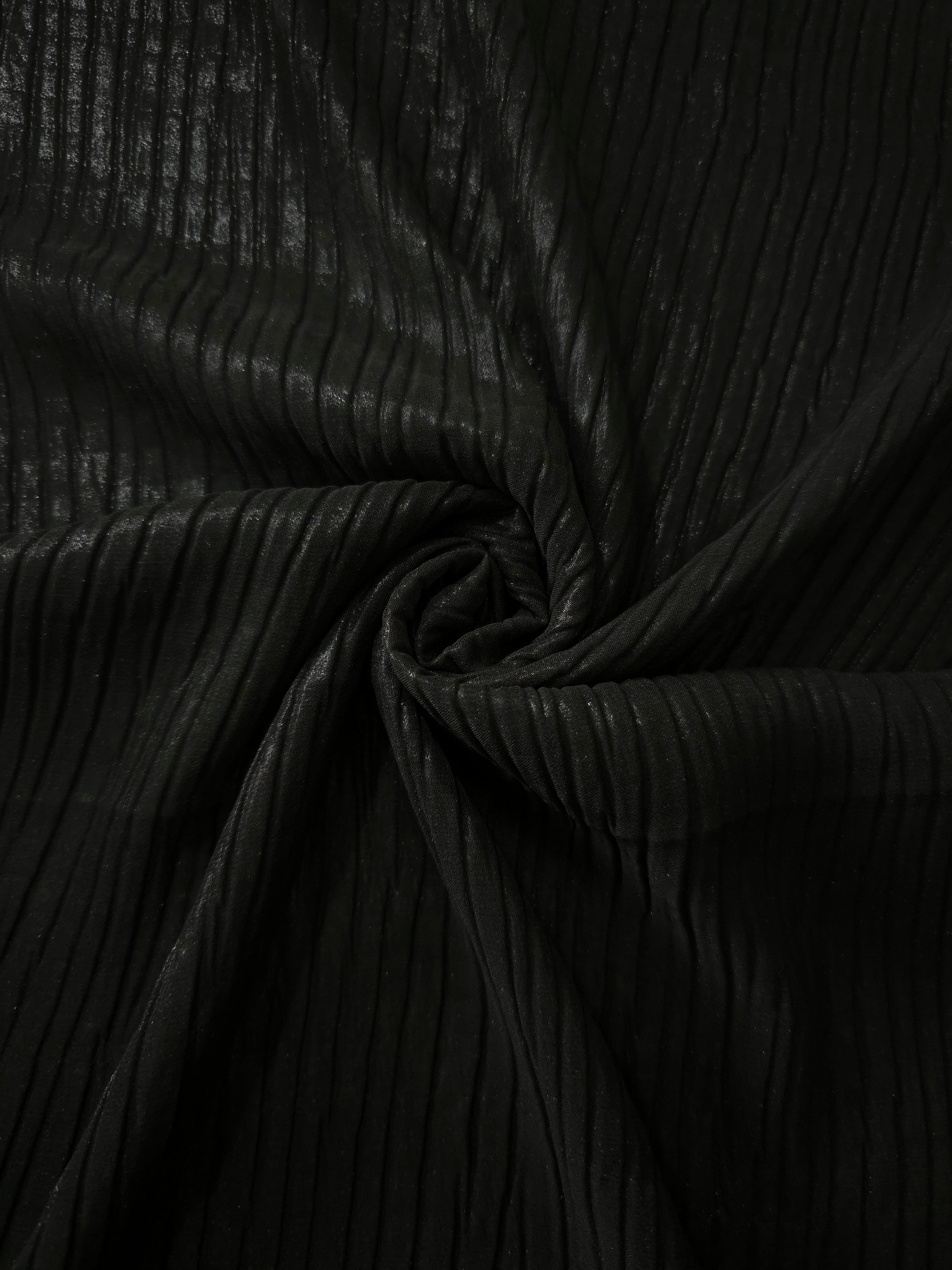 Jet Black shimmer plissé shown in a broad view, making the pleat pattern and visual rhythm clear for blouses, skirts and fashion-forward layering pieces.