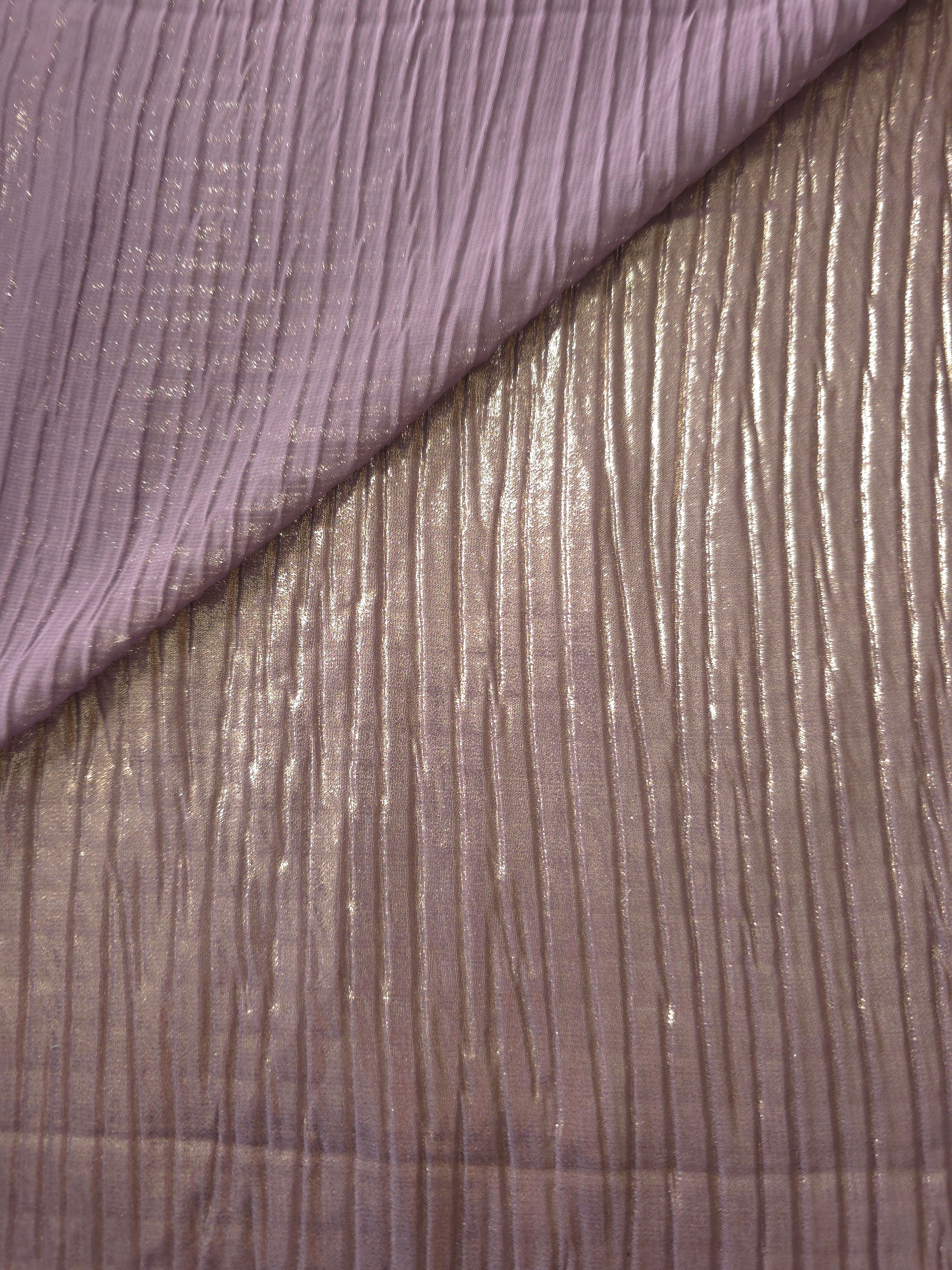 Fold detail of Lavender Taupe classic plissé fabric demonstrates how the textured surface builds depth for stagewear and layered fashion details.