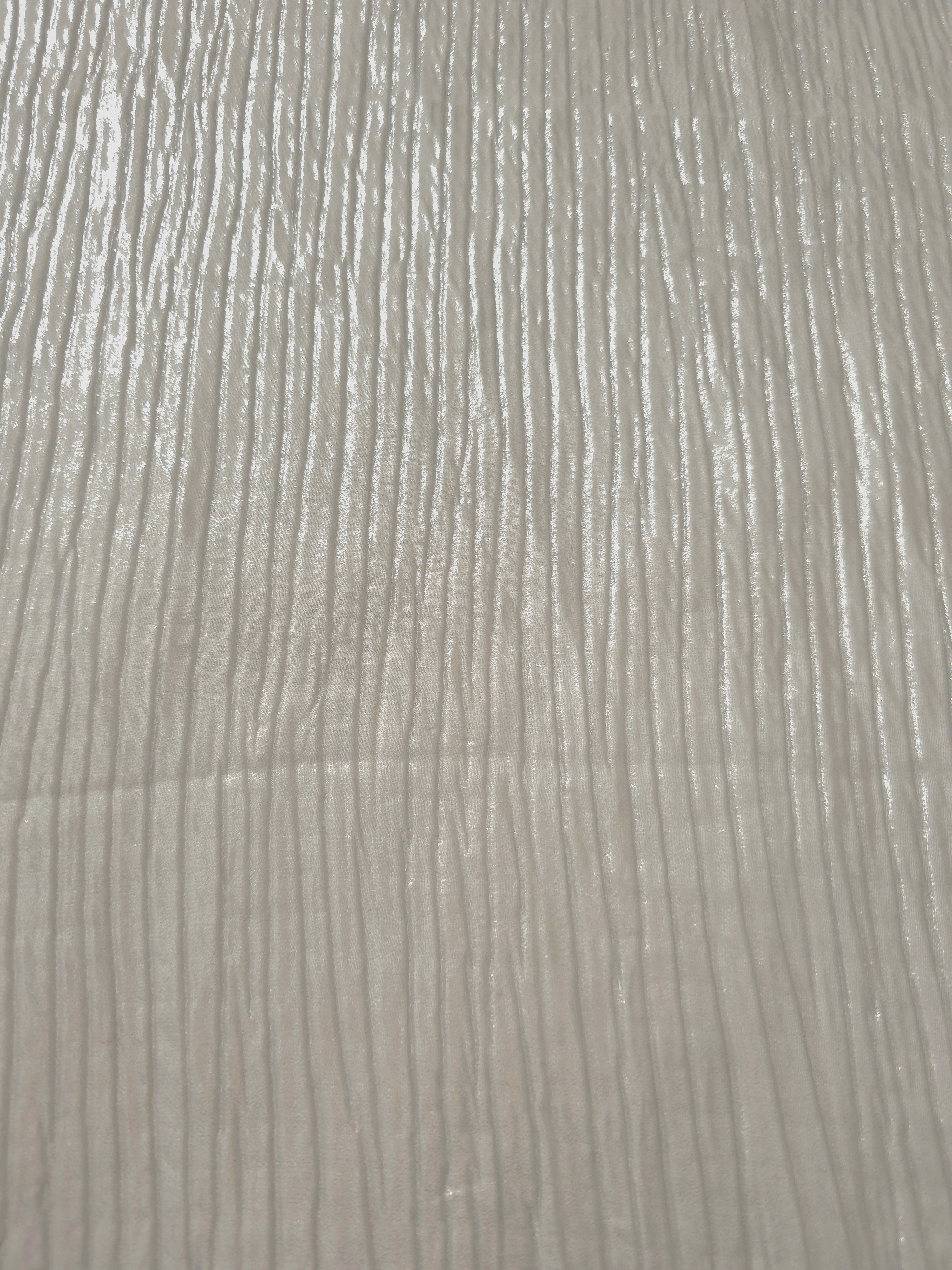 Surface detail of Pearl Gray classic plissé shimmer fabric showcases regular pleated texture for evening clutches, garment accents and special-occasion pieces.