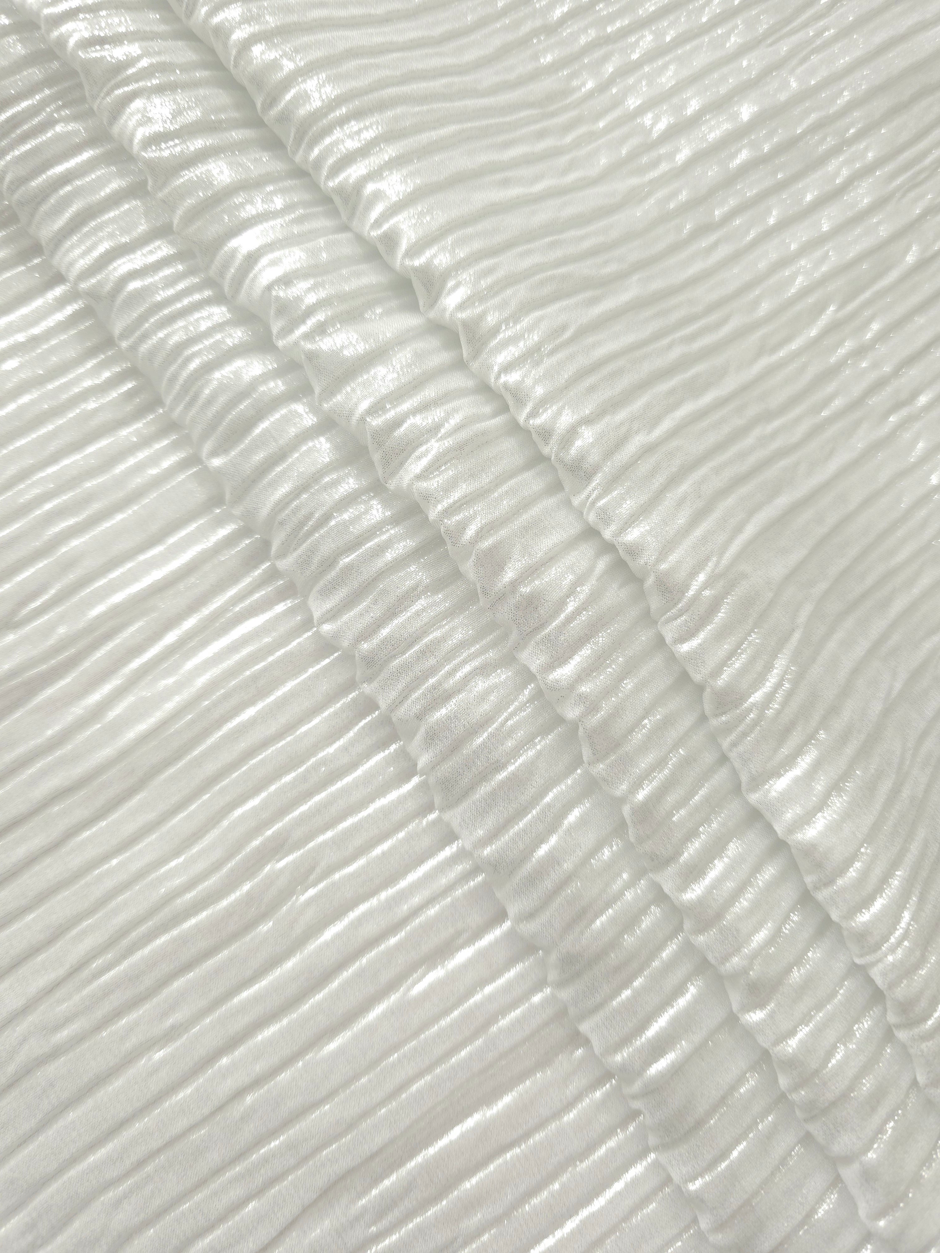 Pearl White classic plissé fabric in close detail, revealing the fine shimmer and dimensional pleat structure suited to bodice accents and fashion-forward blouses.