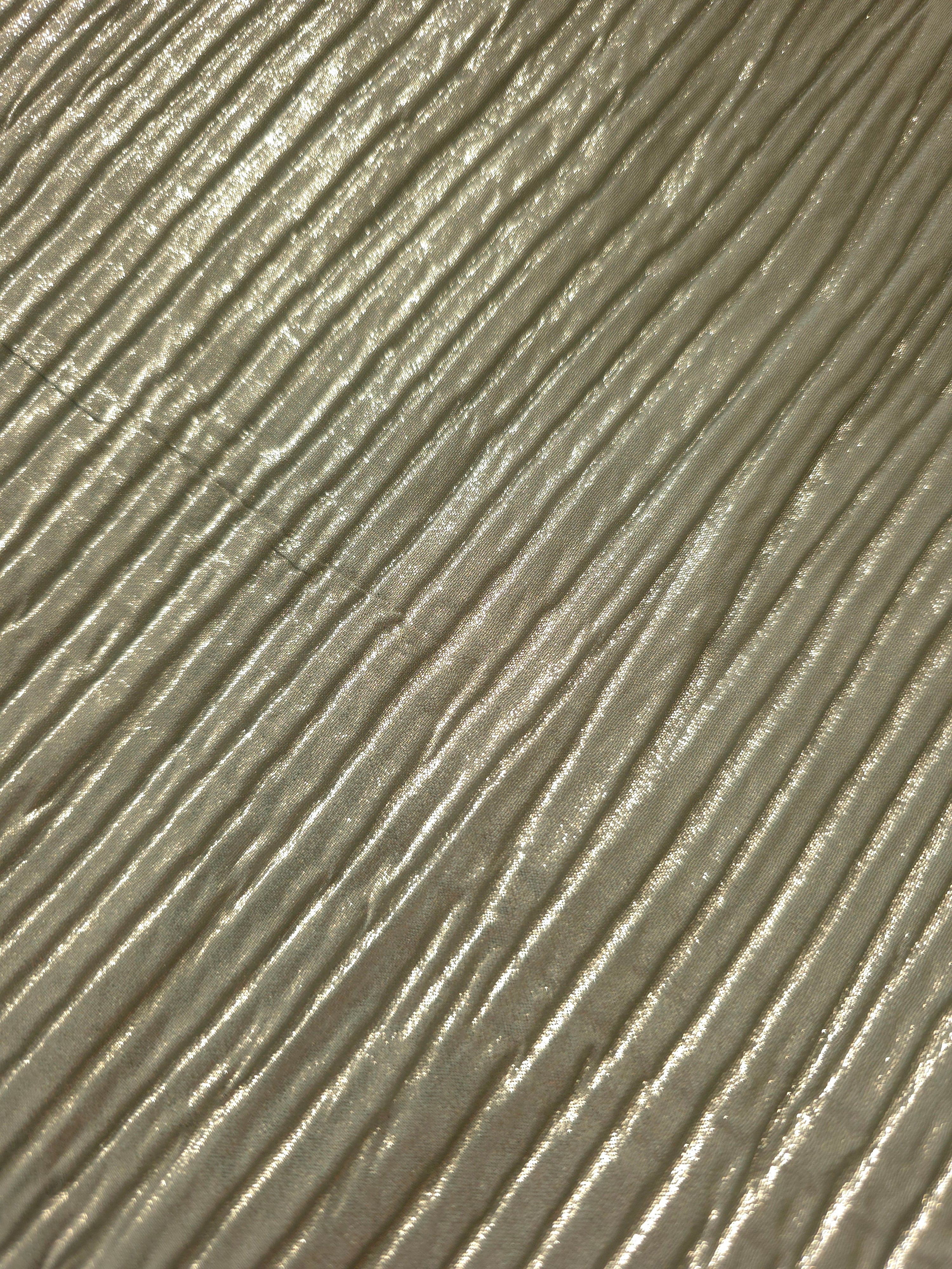 Soft drape of Sage Taupe textured shimmer plissé reveals dimensional folds and shifting reflection for jumpsuits and fluid occasionwear.