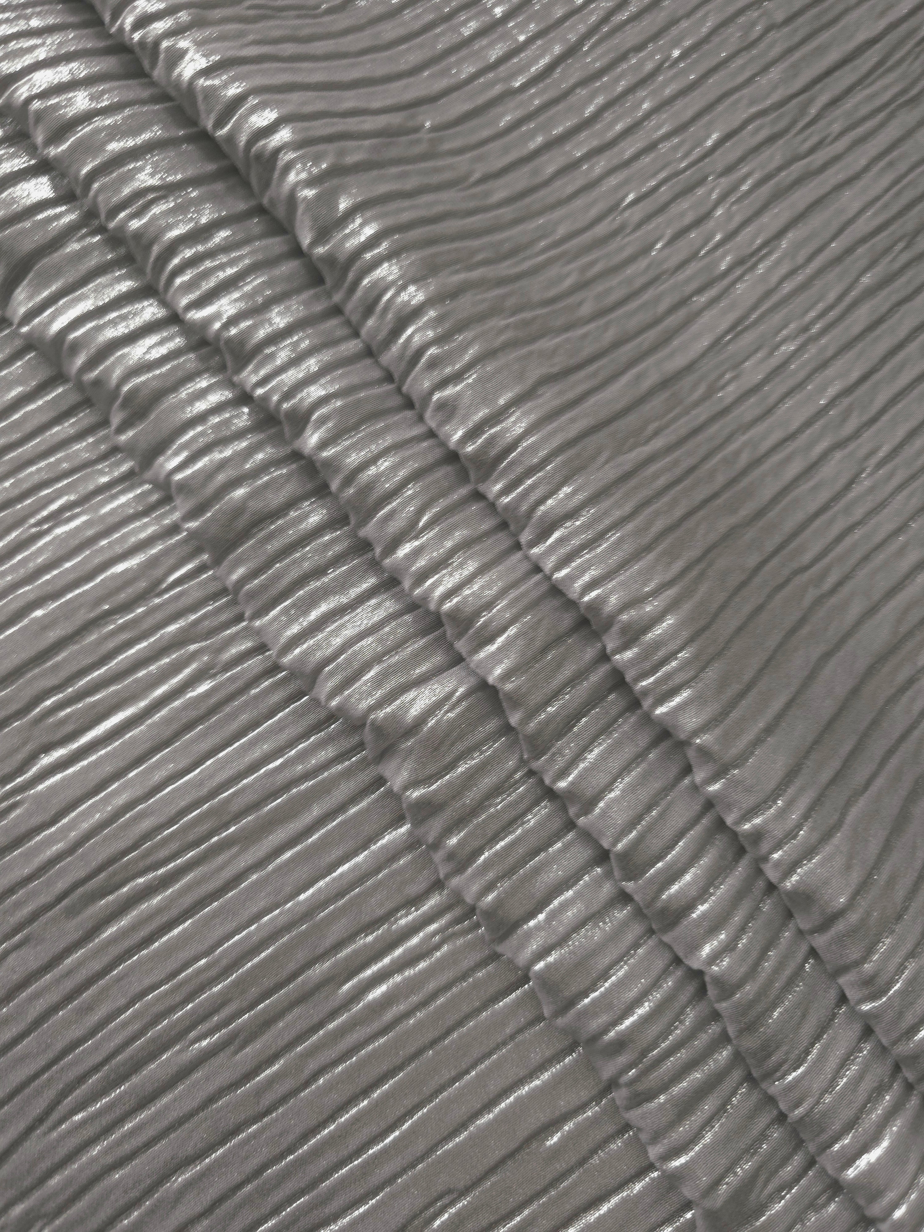 Silver Gray classic plissé fabric in close detail, revealing the fine shimmer and dimensional pleat structure suited to bodice accents and fashion-forward blouses.