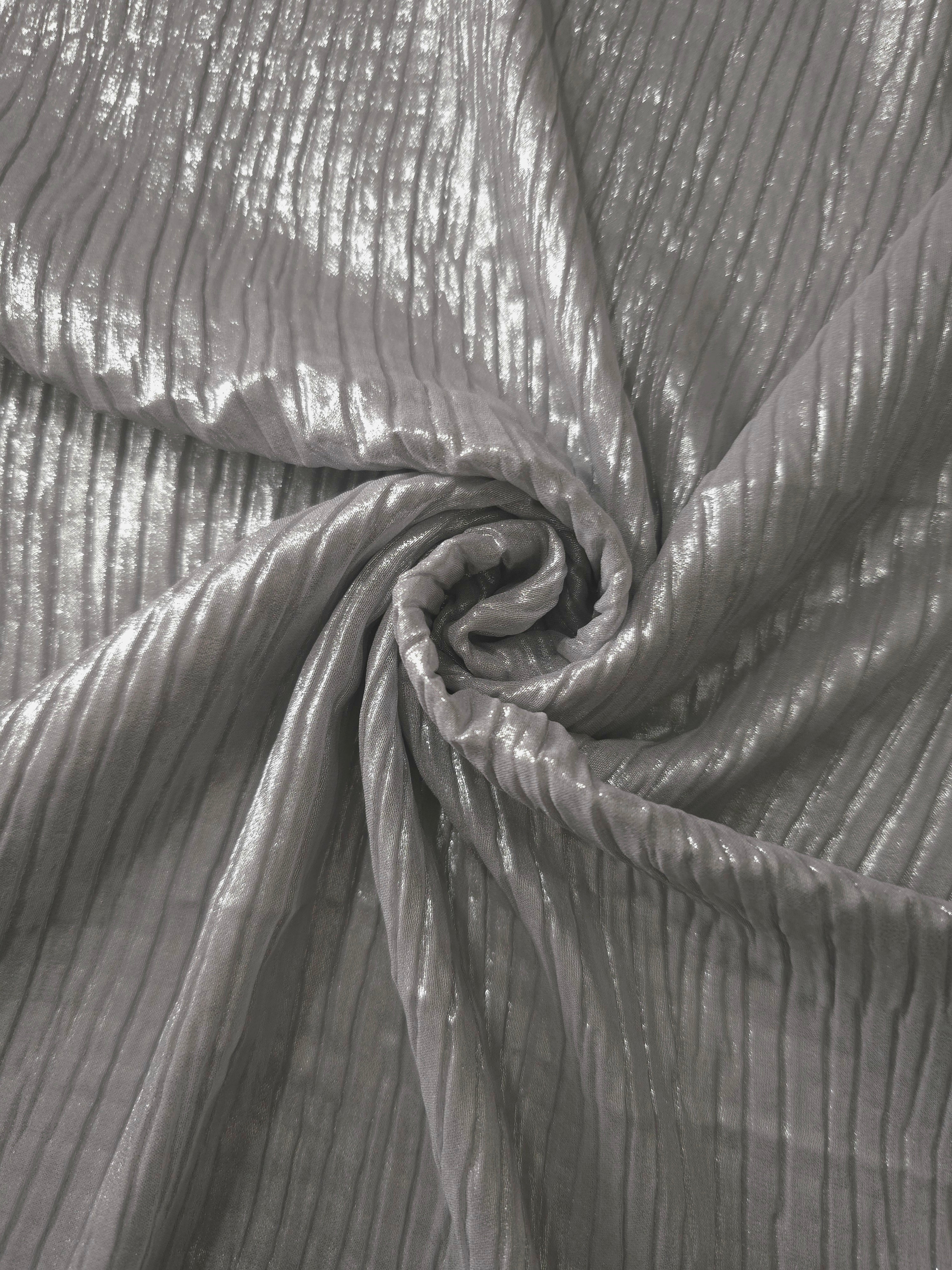 Silver Gray shimmer plissé shown in a broad view, making the pleat pattern and visual rhythm clear for blouses, skirts and fashion-forward layering pieces.