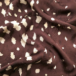 Ivory pebble scatter Turkish rayon viscose jacquard fabric on chocolate brown base