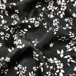 Ivory wildflower scatter Turkish rayon viscose jacquard fabric on black base