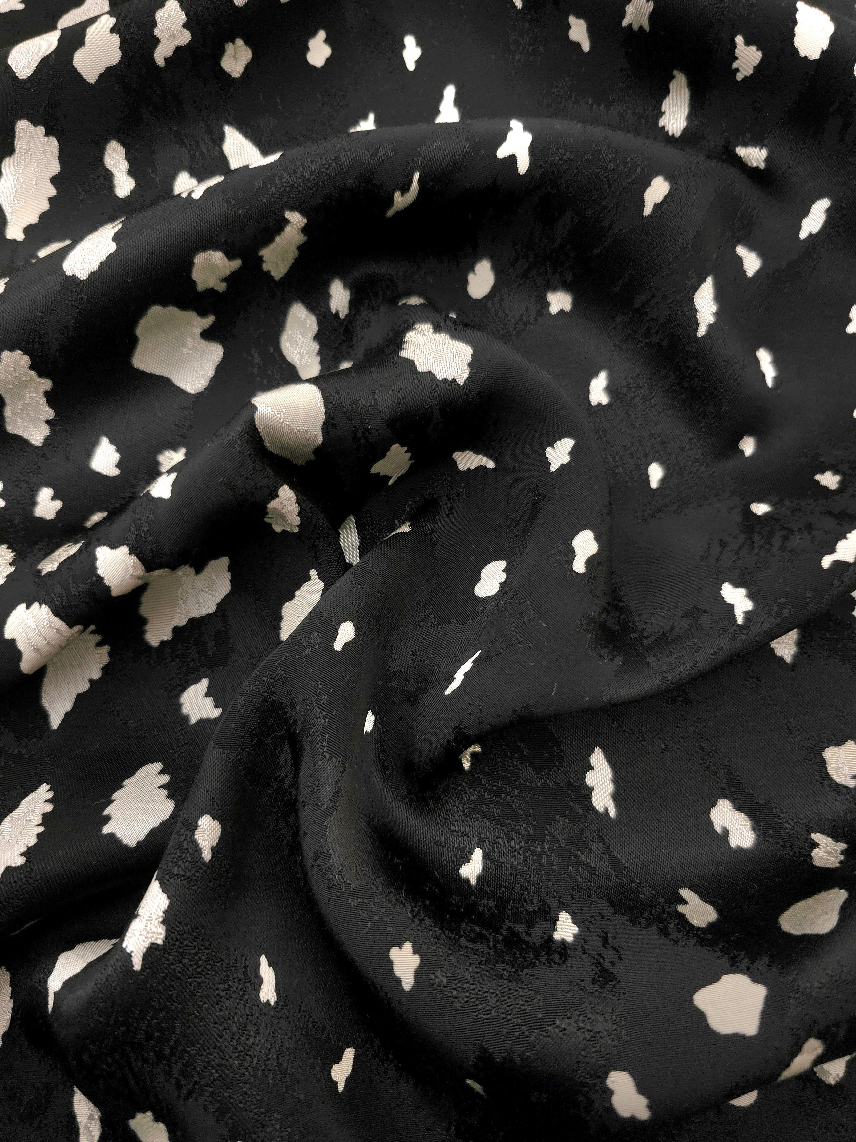 Ivory pebble scatter Turkish rayon viscose jacquard fabric on black base