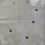 Front and back view of Flower printed rayon-viscose jacquard fabric