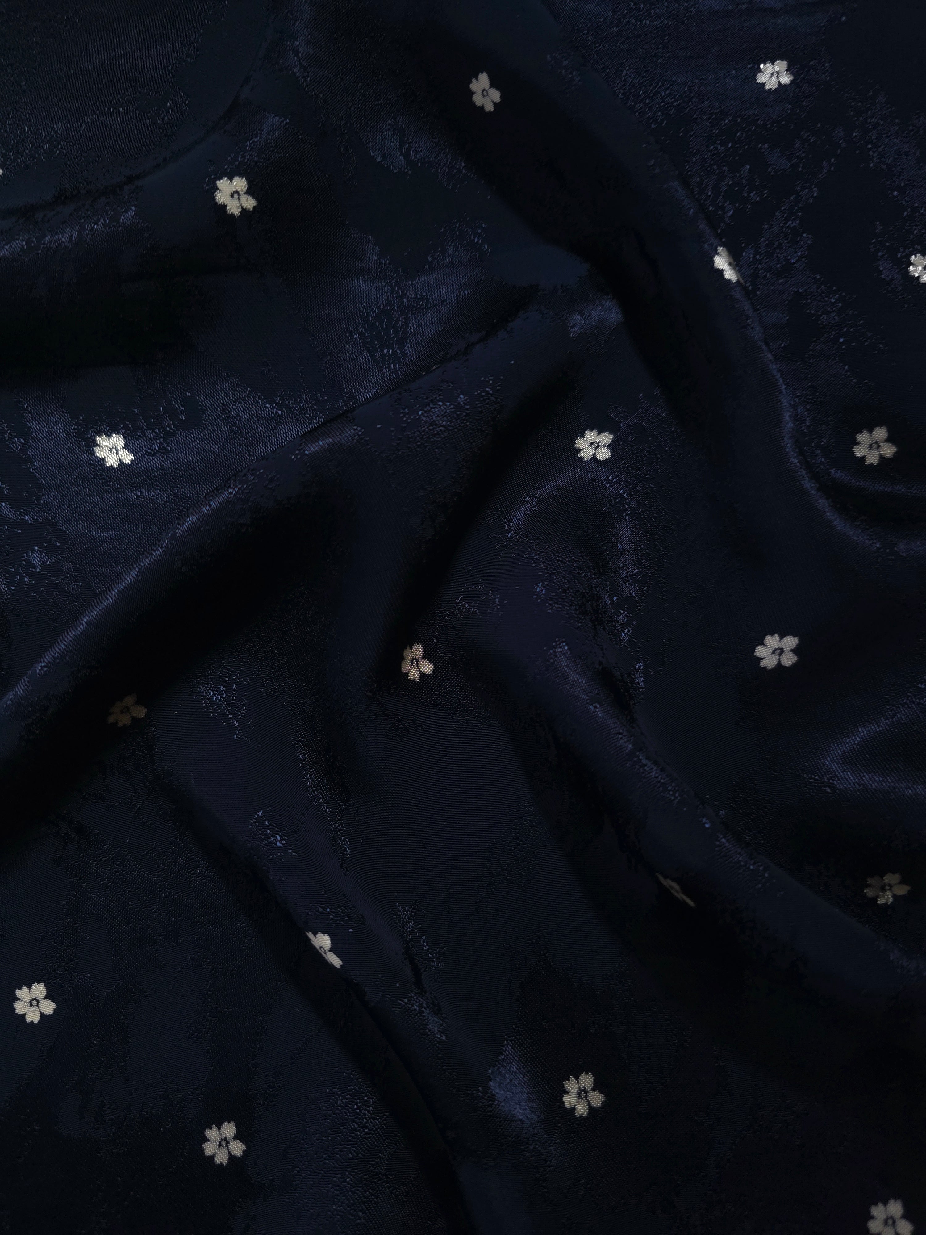 Navy blue flower print Turkish rayon viscose jacquard fabric in a wave drape