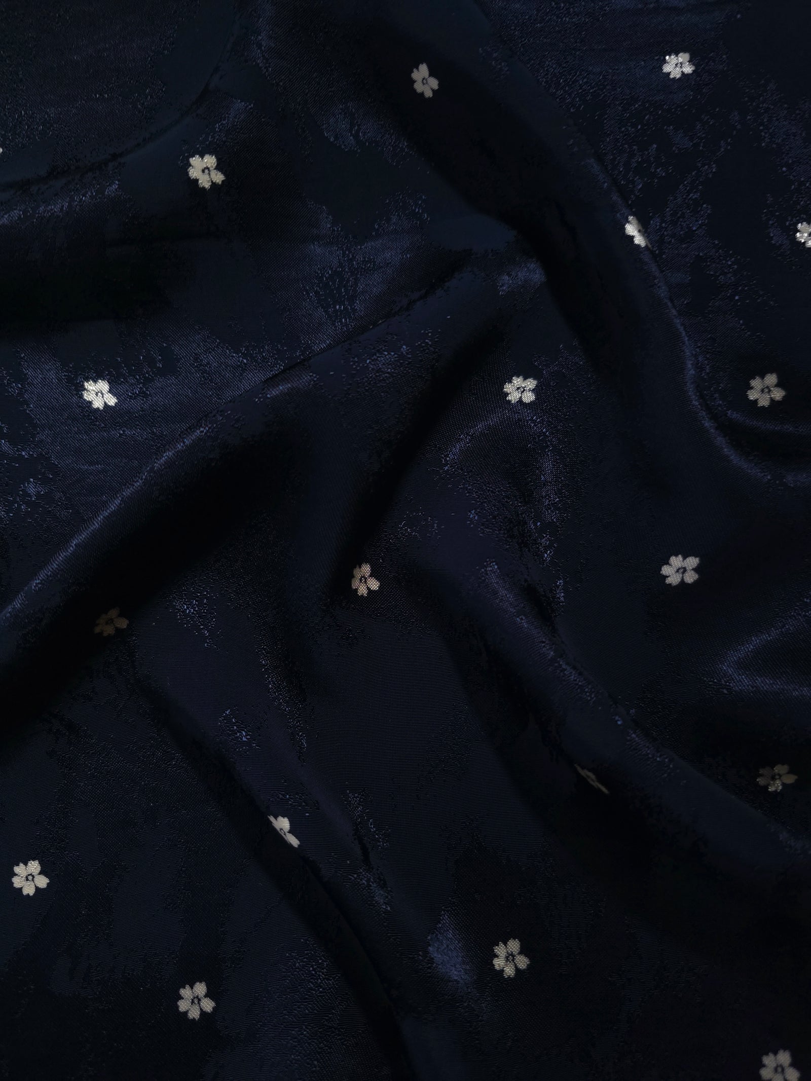 Navy blue flower print Turkish rayon viscose jacquard fabric in a wave drape