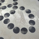 Close-up of Polka Dot Chain rotary print on Turkish rayon-viscose jacquard fabric