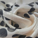 Close-up of draped Polka Dot Chain printed jacquard fabric showing fold detail