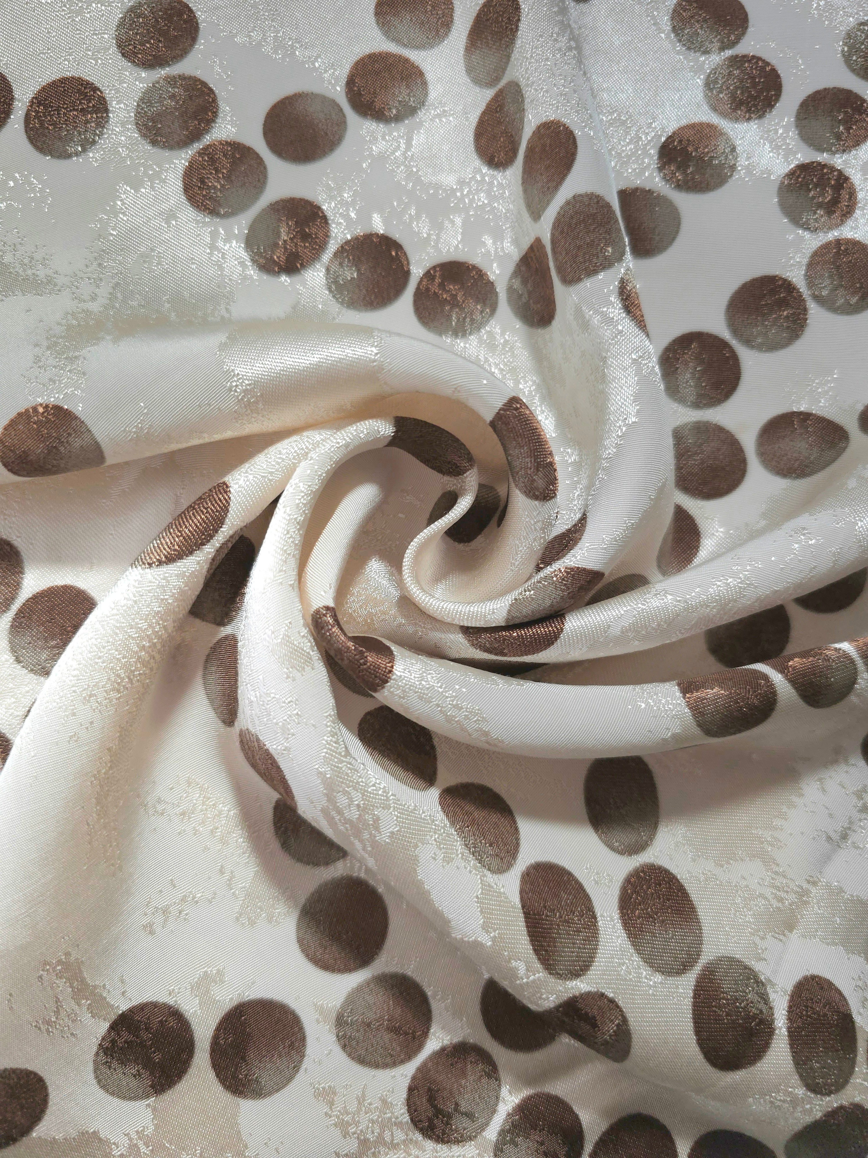 Polka Dot Chain rotary print on Turkish jacquard fabric, draped showing fluid movement
