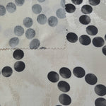 Front and back view of Polka Dot Chain printed rayon-viscose jacquard fabric