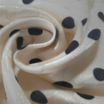 Close-up of draped Polka Dot printed jacquard fabric showing fold detail