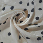 Polka Dot rotary print on Turkish jacquard fabric, draped showing fluid movement