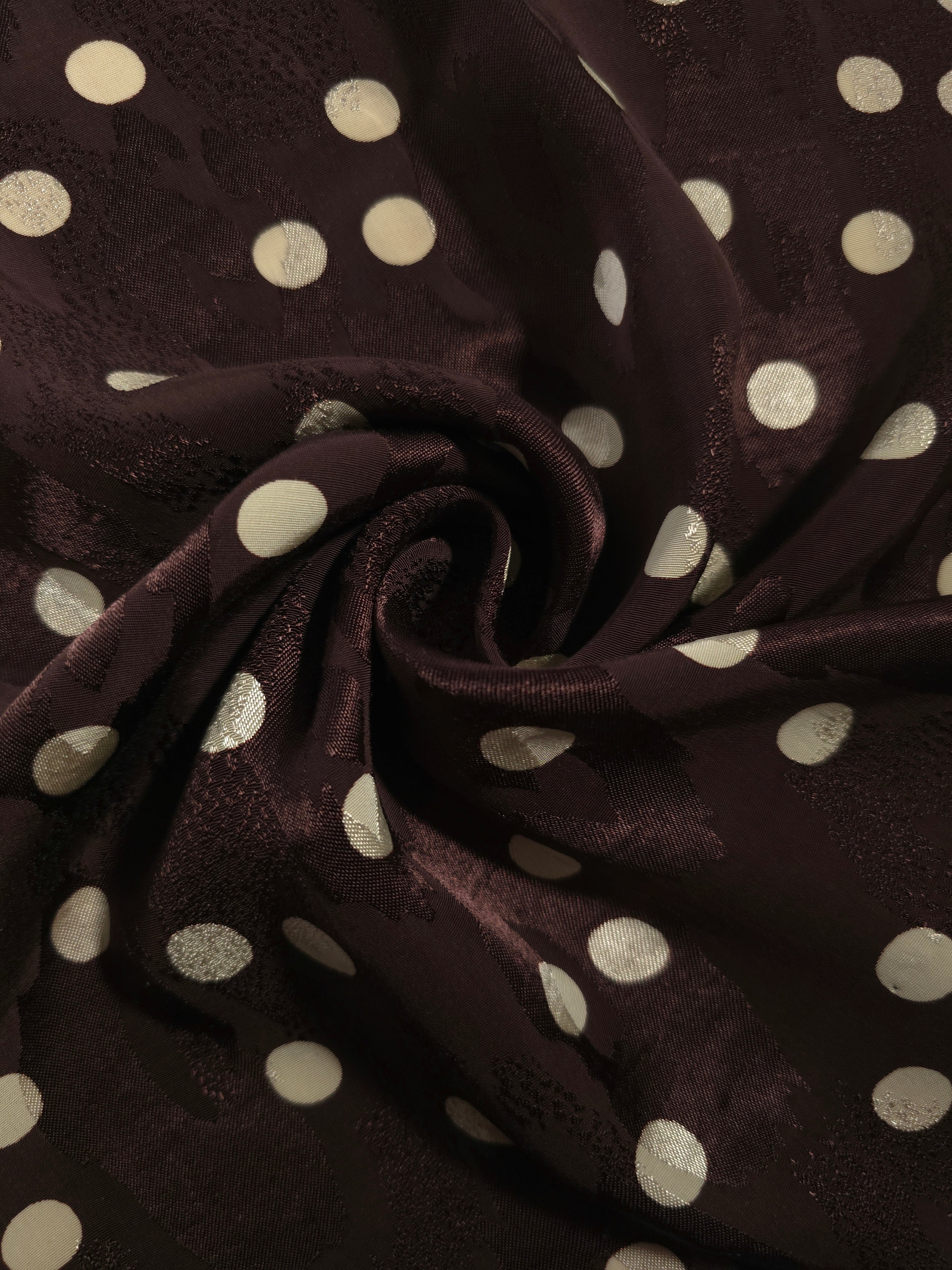 Polka Dot rotary print on Turkish jacquard fabric, draped showing fluid movement