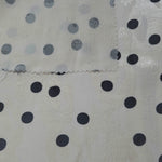 Front and back view of Polka Dot printed rayon-viscose jacquard fabric